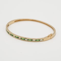 Bracelet rigide en or jaune 14 carats avec grenat tsavorite et péridot