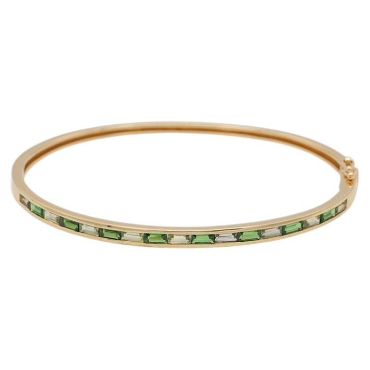 Tsavorite Garnet and Peridot 14 Karat Yellow Gold Bangle For Sale