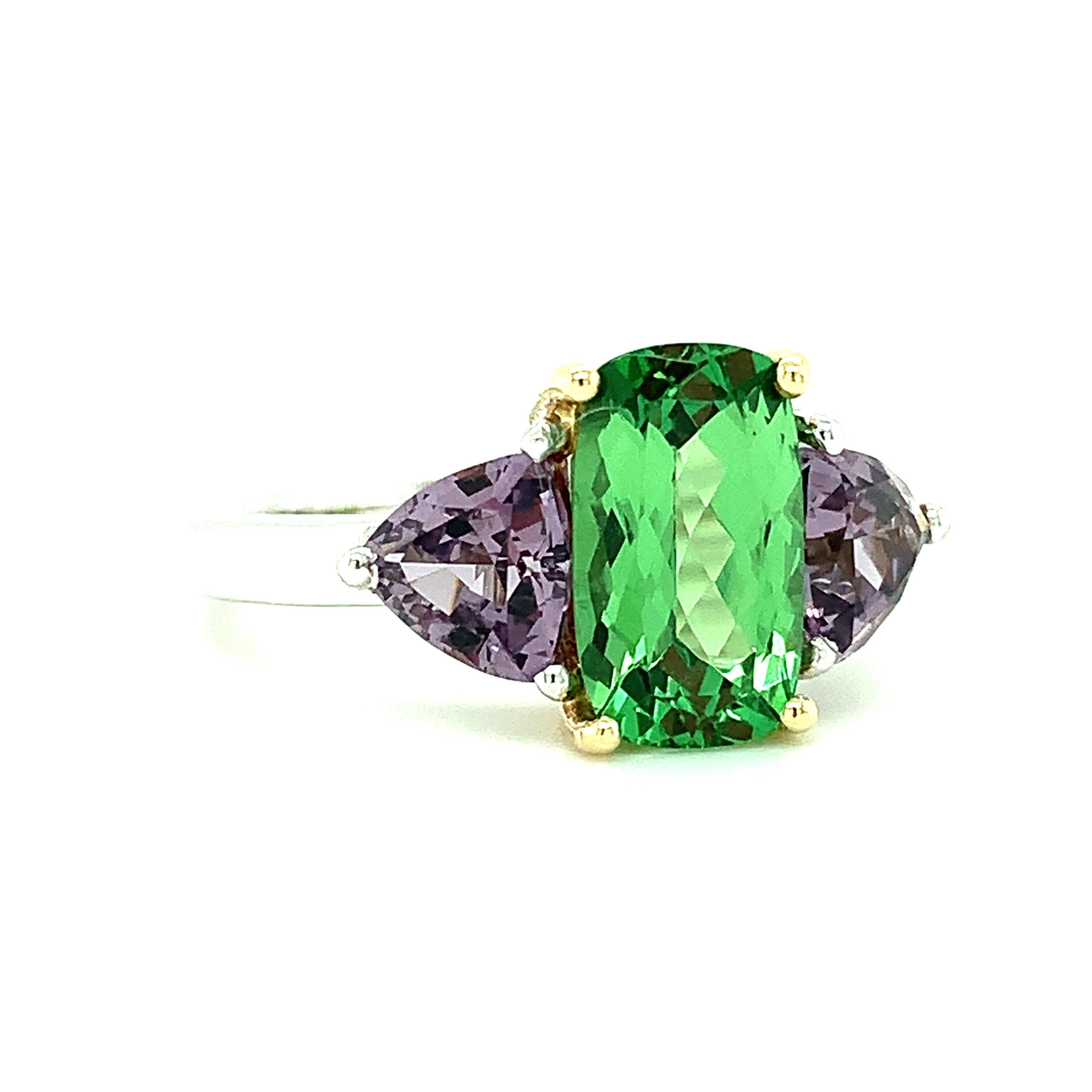 green and purple engagement ring