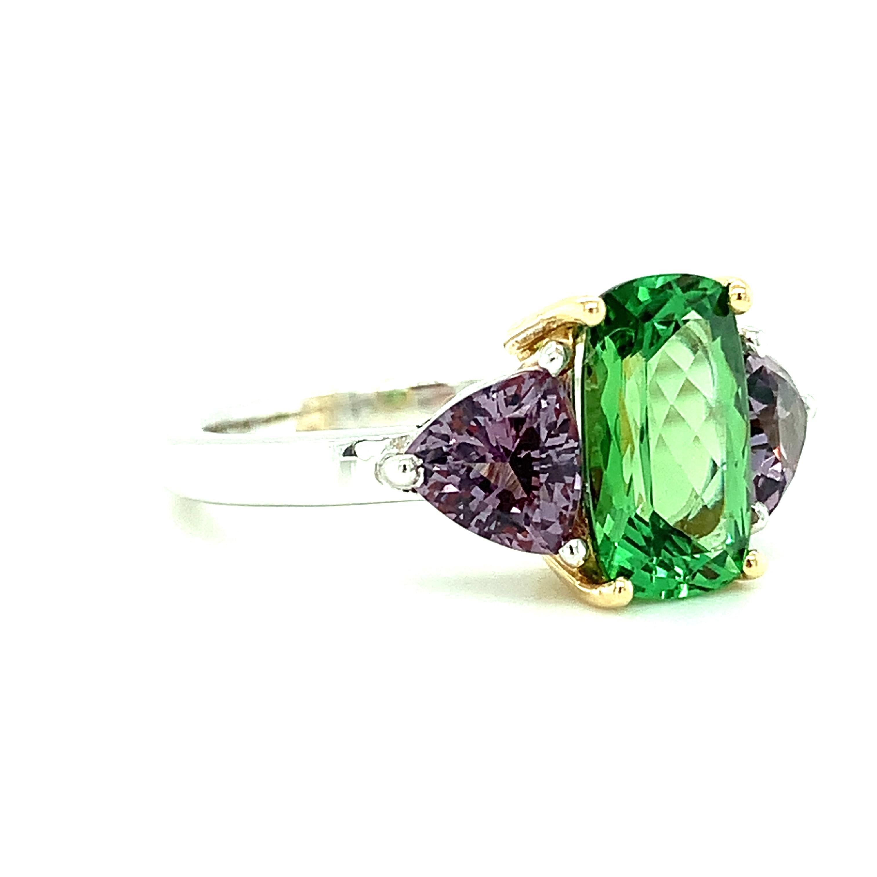 purple and green engagement ring