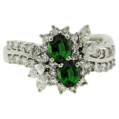 Bague en platine avec tsavorite, grenat et diamants