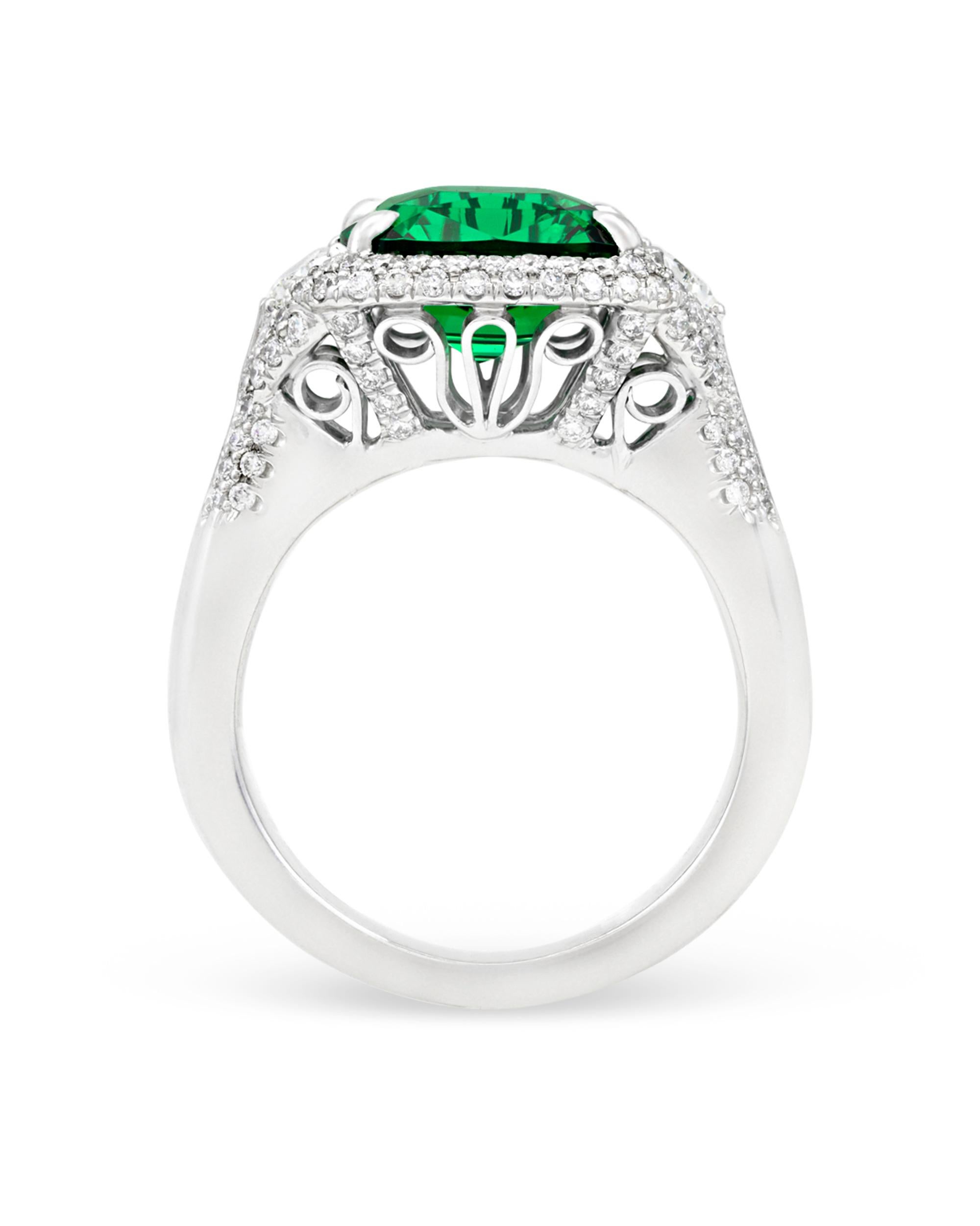 Prized for its rarity, luminosity and durability, the tsavorite garnet is truly a show-stopper of a gemstone. Weighing 5.12 carats, this example is among the best of its kind, exhibiting the perfect intense emerald green hue found only in the finest