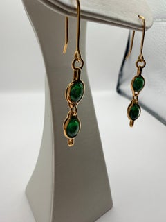 Tsavorite green gemstones earrings 18KT yellow gold