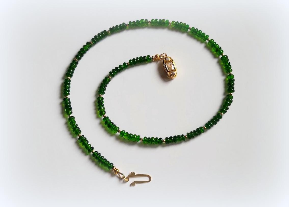 The length of the necklace is 16.5 inches (42 cm). The size of the smooth rondelle beads is 4 mm. The tsavorite beads are high-quality AAA. Tsavorite is mined in Tanzania.
An emerald-green variety of grossular garnet, tsavorite is one of the most