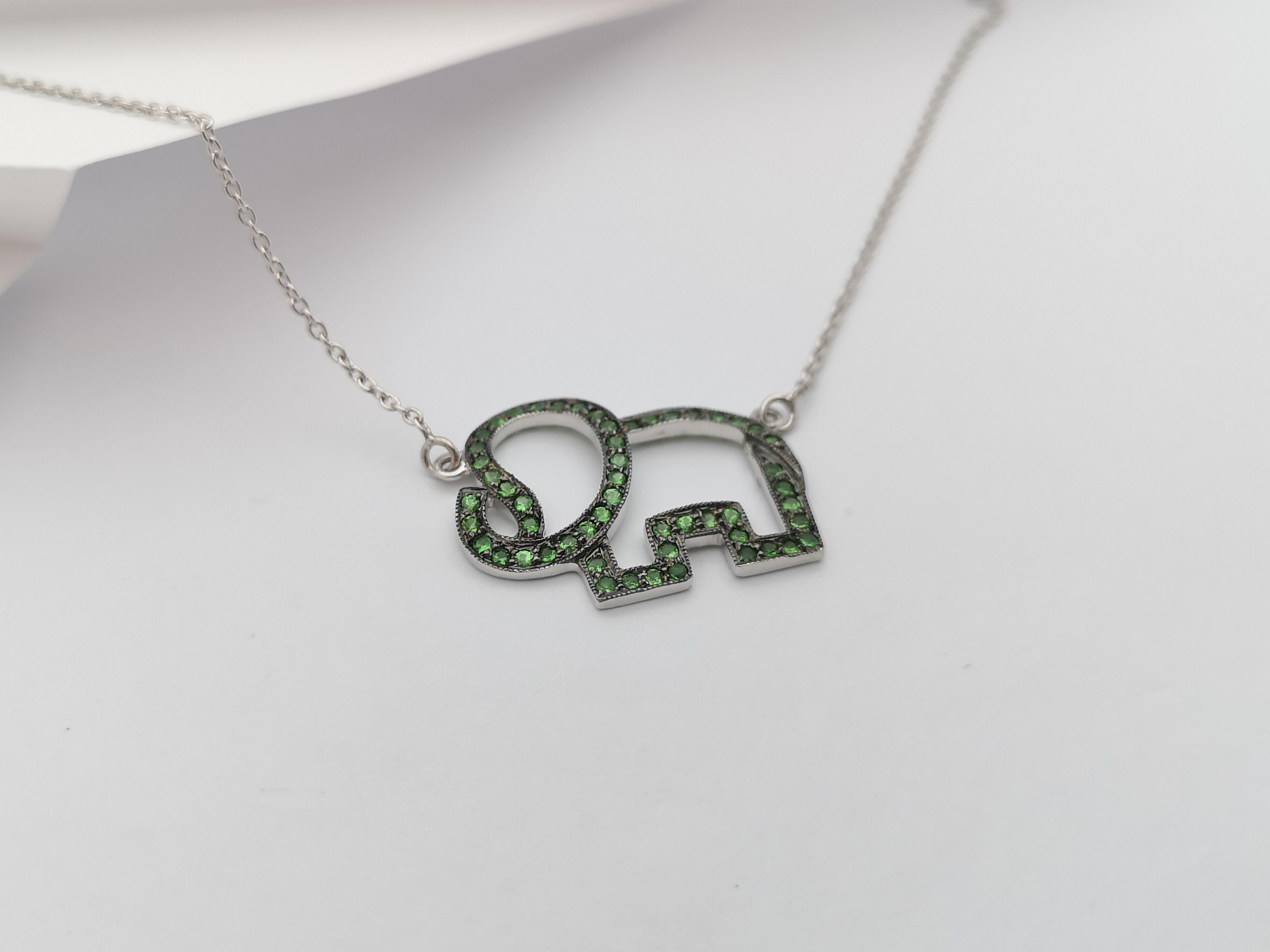 Tsavorite Necklace set in Silver Settings

Width:  1.9 cm 
Length:  45.5 cm
Total Weight: 3.39 grams

*Please note that the silver setting is plated with rhodium to promote shine and help prevent oxidation.  However, with the nature of silver,
