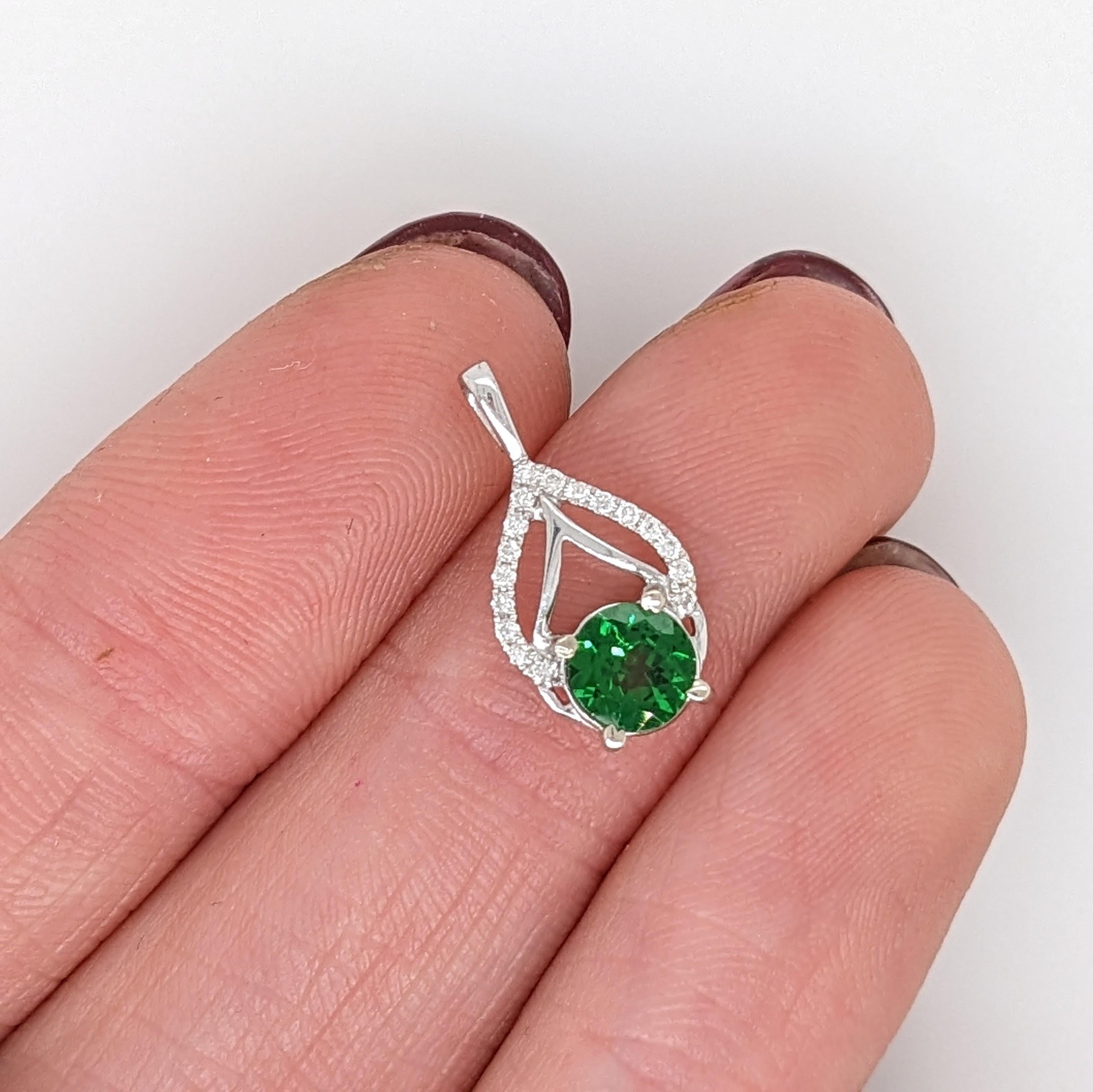 This beautiful pendant features a sparkling light green 0.56ct tsavorite pendant with natural earth-mined diamonds in solid 14k white gold. A unique pendant design to add to your collection and for everyday wear! Tsavorite being a type of a garnet
