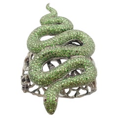 Used Tsavorite with Cabochon Ruby Snake Bangle set in Silver Settings