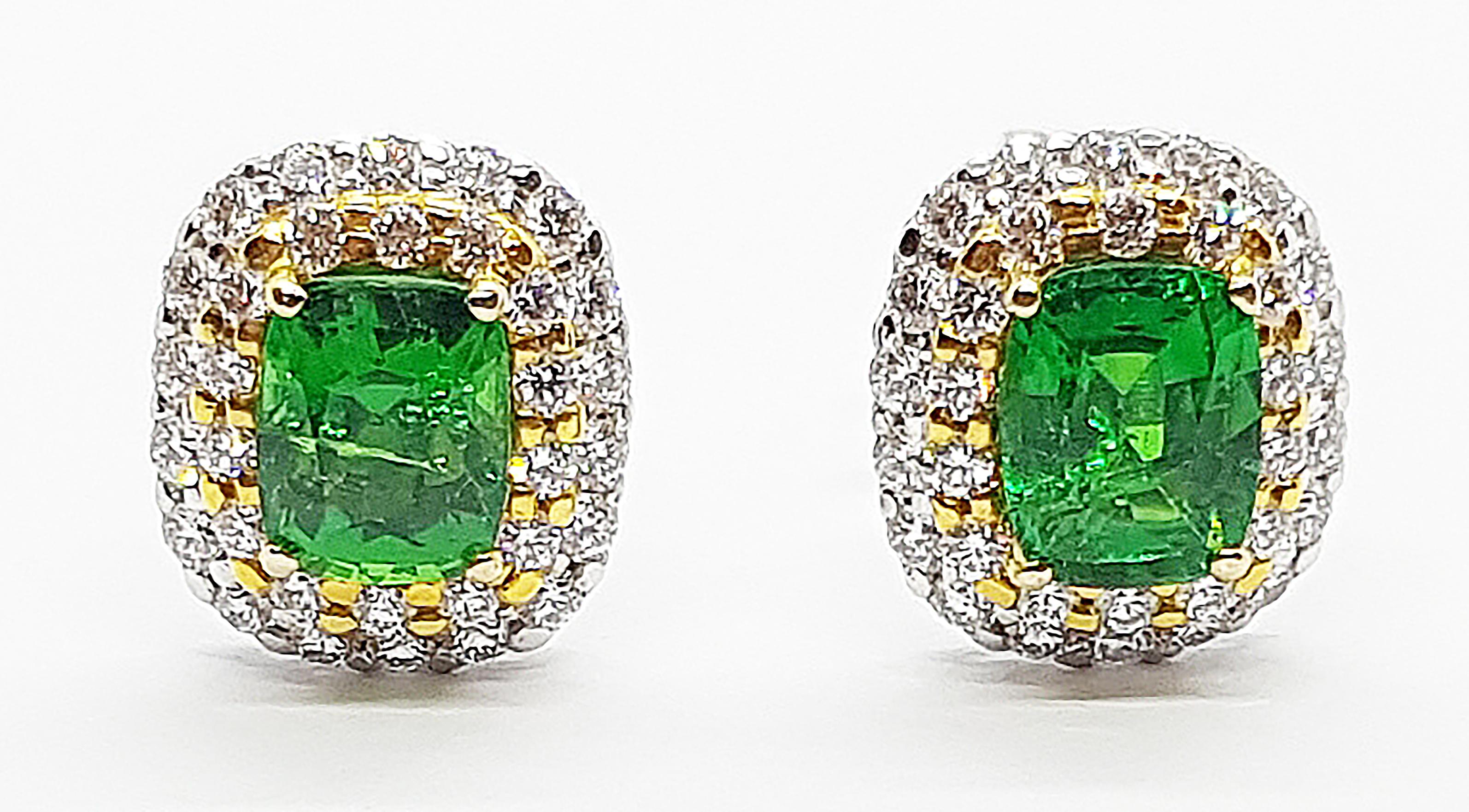 Tsavorite 2.91 carats with Diamond 1.01 carats Earrings set in 18 Karat White Gold Settings

Width:  0.6 cm 
Length: 0.7 cm
Total Weight: 5.89 grams

