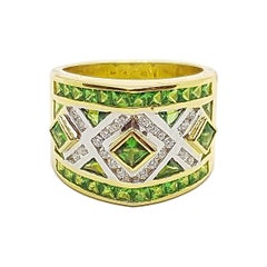Anillo de Tsavorita con Diamantes engastado en Oro de 18 Kilates