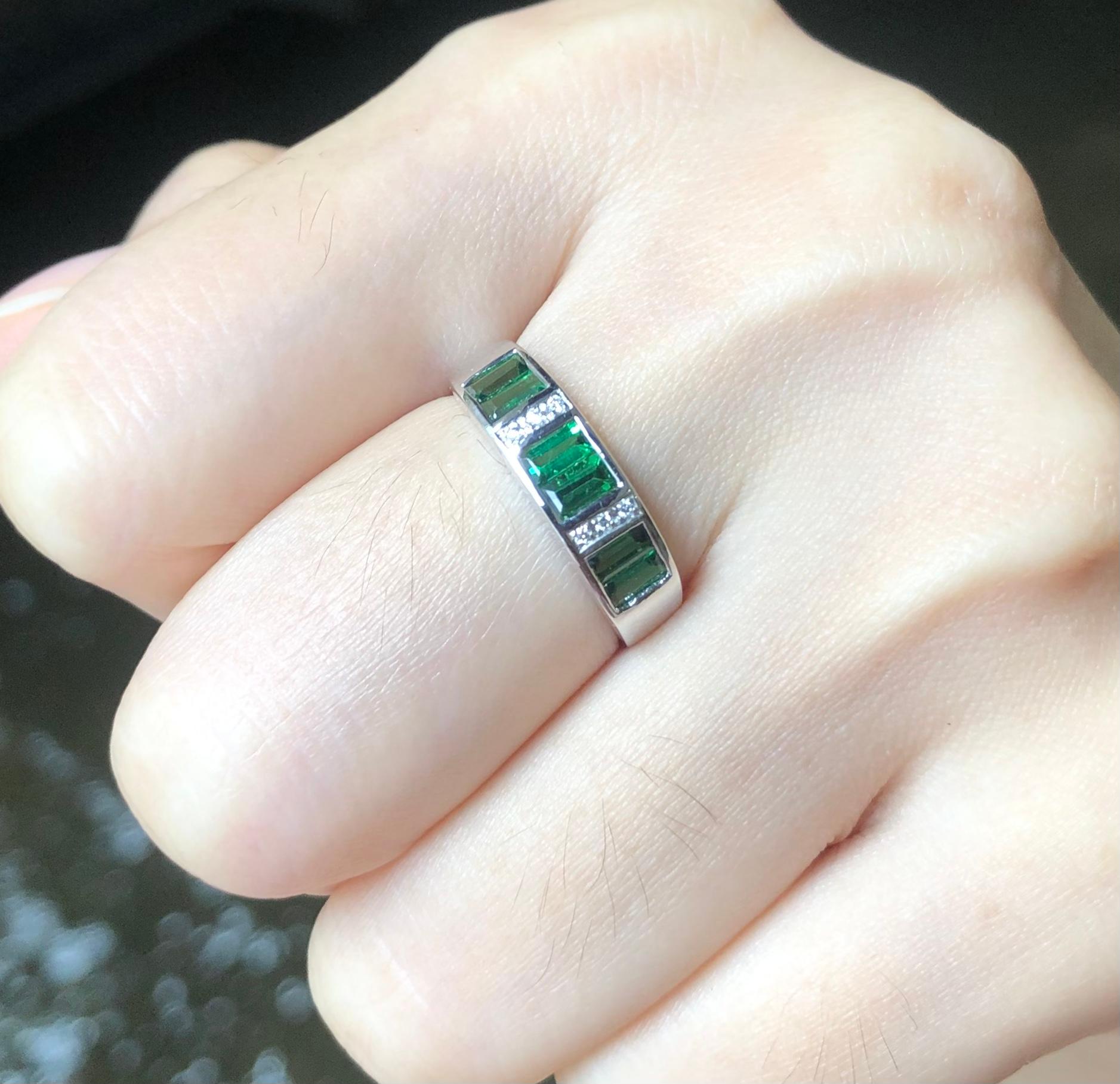 Tsavorite 0.74 carat with Diamond 0.03 carat Ring set in 18 Karat White Gold Settings

Width:  1.6 cm 
Length: 0.5 cm
Ring Size: 53
Total Weight: 3.74 grams

