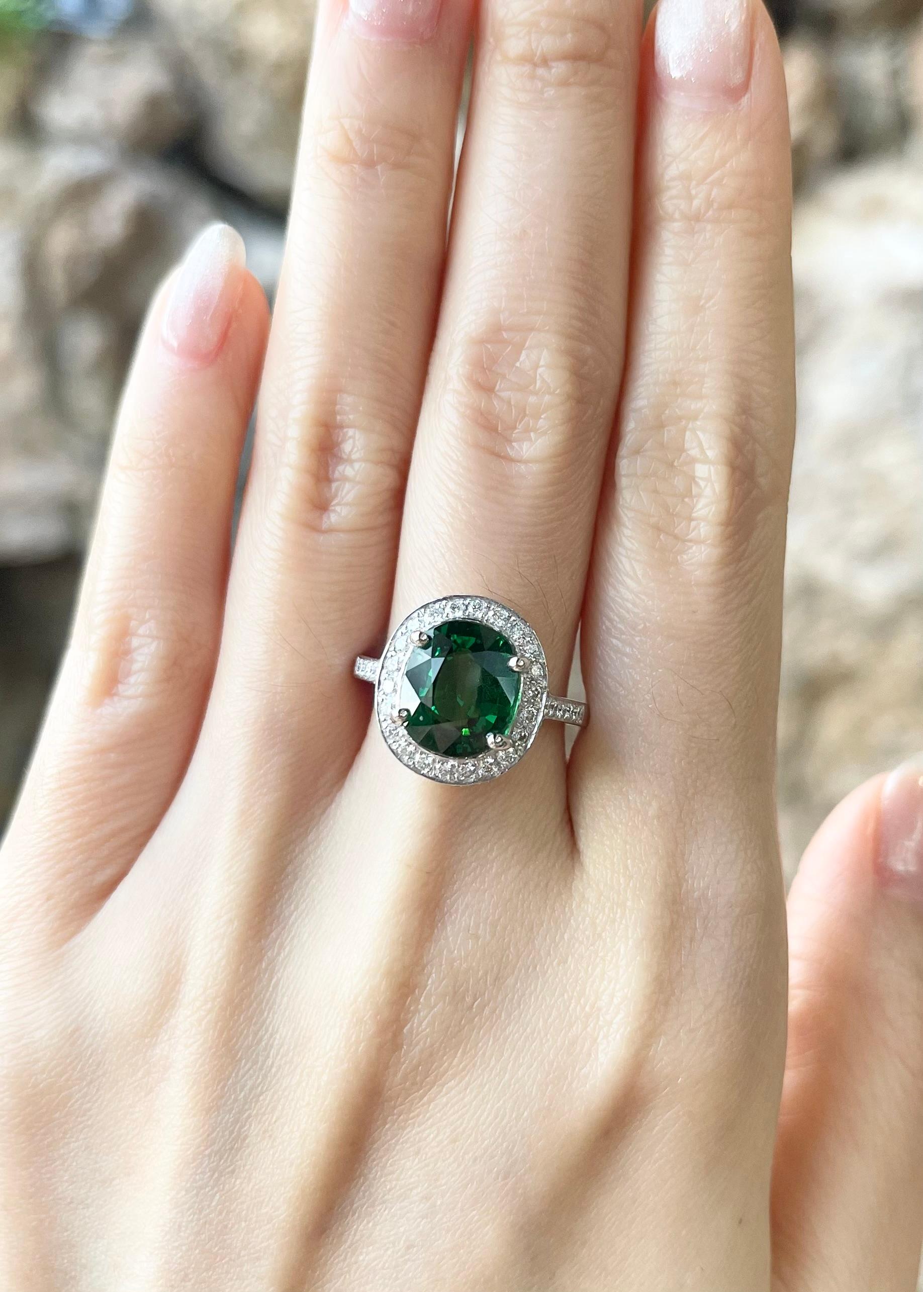 Tsavorite 5.13 carats with Diamond 0.57 carat Ring set in Platinum 950 Settings

Width:  1.3 cm 
Length: 1.6 cm
Ring Size: 53
Total Weight: 10.17 grams

