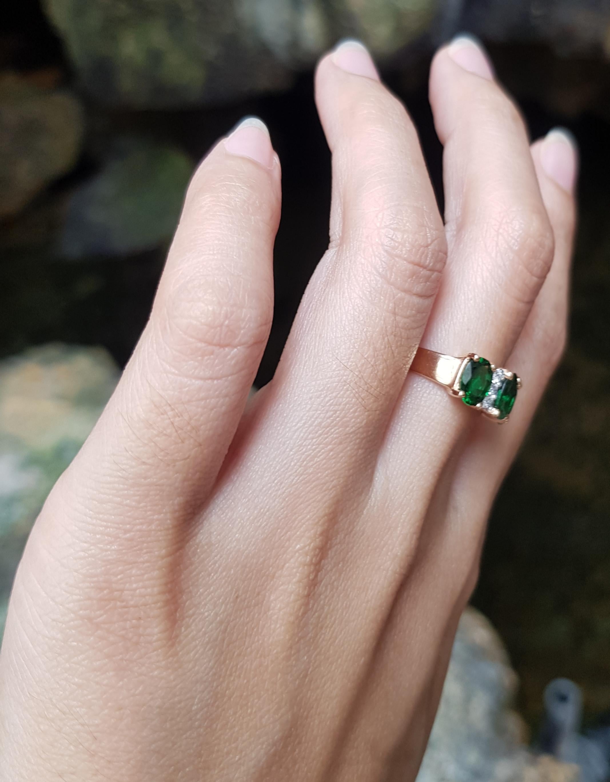 Contemporary Tsavorite with Diamond Ring Set in 18 Karat Rose Gold Settings For Sale