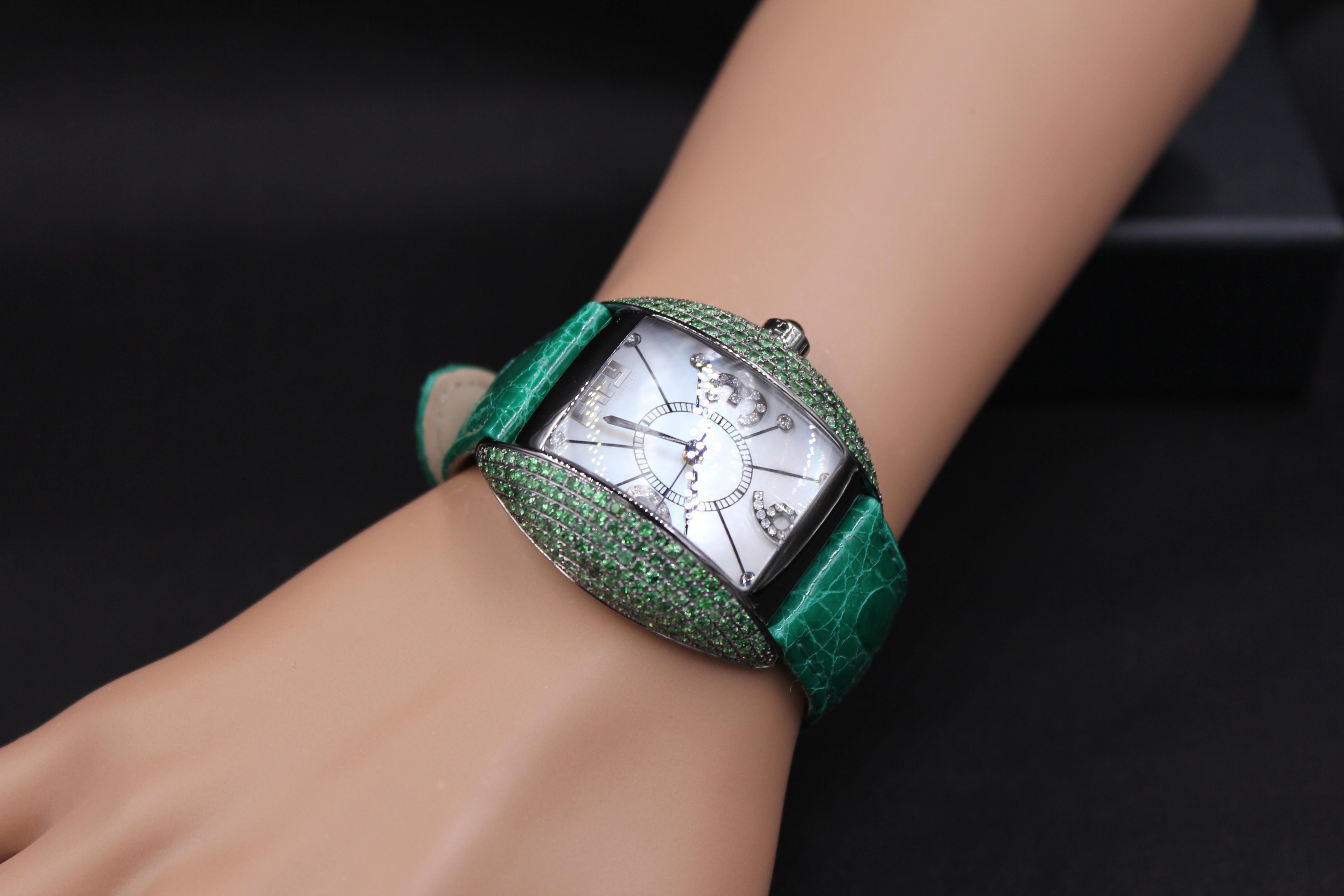 ·      Quality Swiss-Quartz movement guarantees precision timing
·         Mother-of-Pearl dial micro-paved with diamonds and gemstones enhances any dress style
·         Scratch-resistant sapphire glass lens
·         Genuine exotic lizard leather