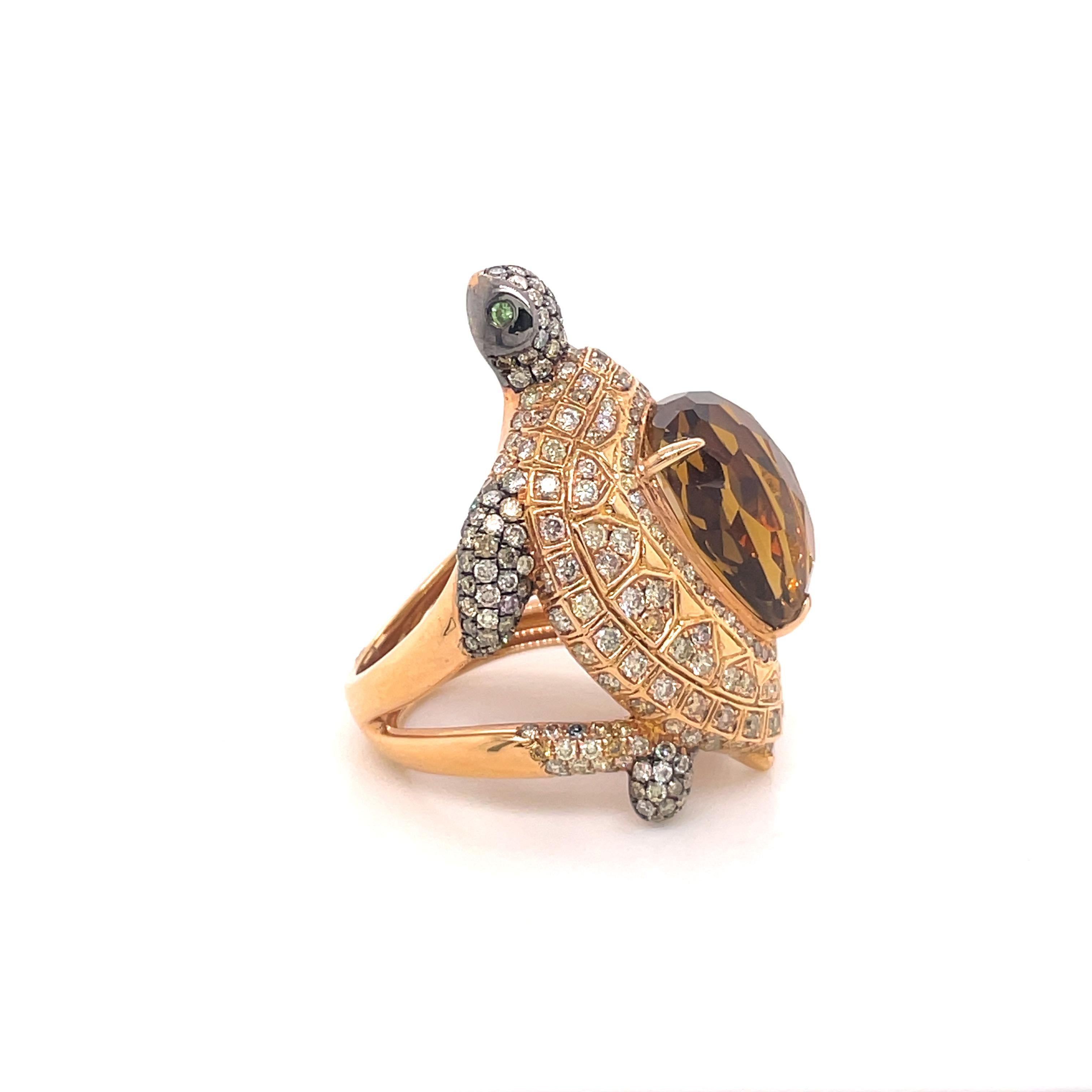This captivating masterpiece that embodies the wonders of the natural world. The turtle's eyes are adorned with mesmerizing tsavorite gemstones, their deep green hue drawing you into the creature's soul. Its intricate body, crafted with exquisite