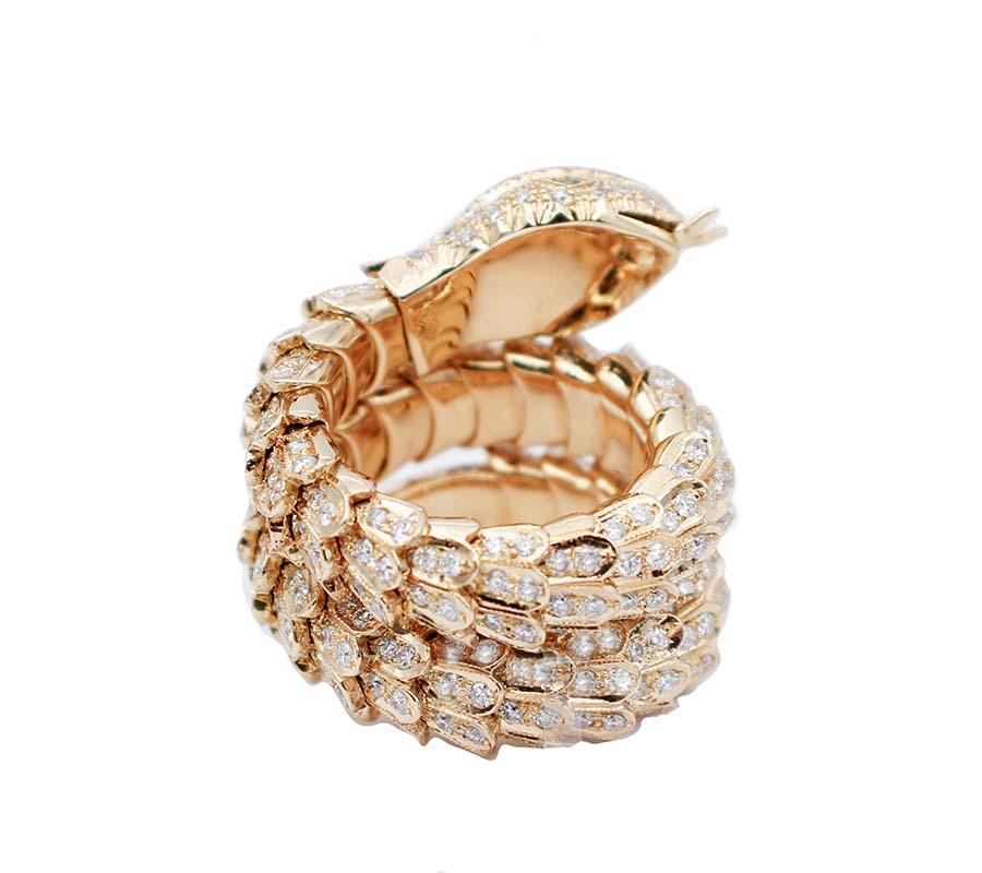 Modern Tsavorites, Diamonds, 18 Karat Yellow Gold Snake Shape Ring For Sale