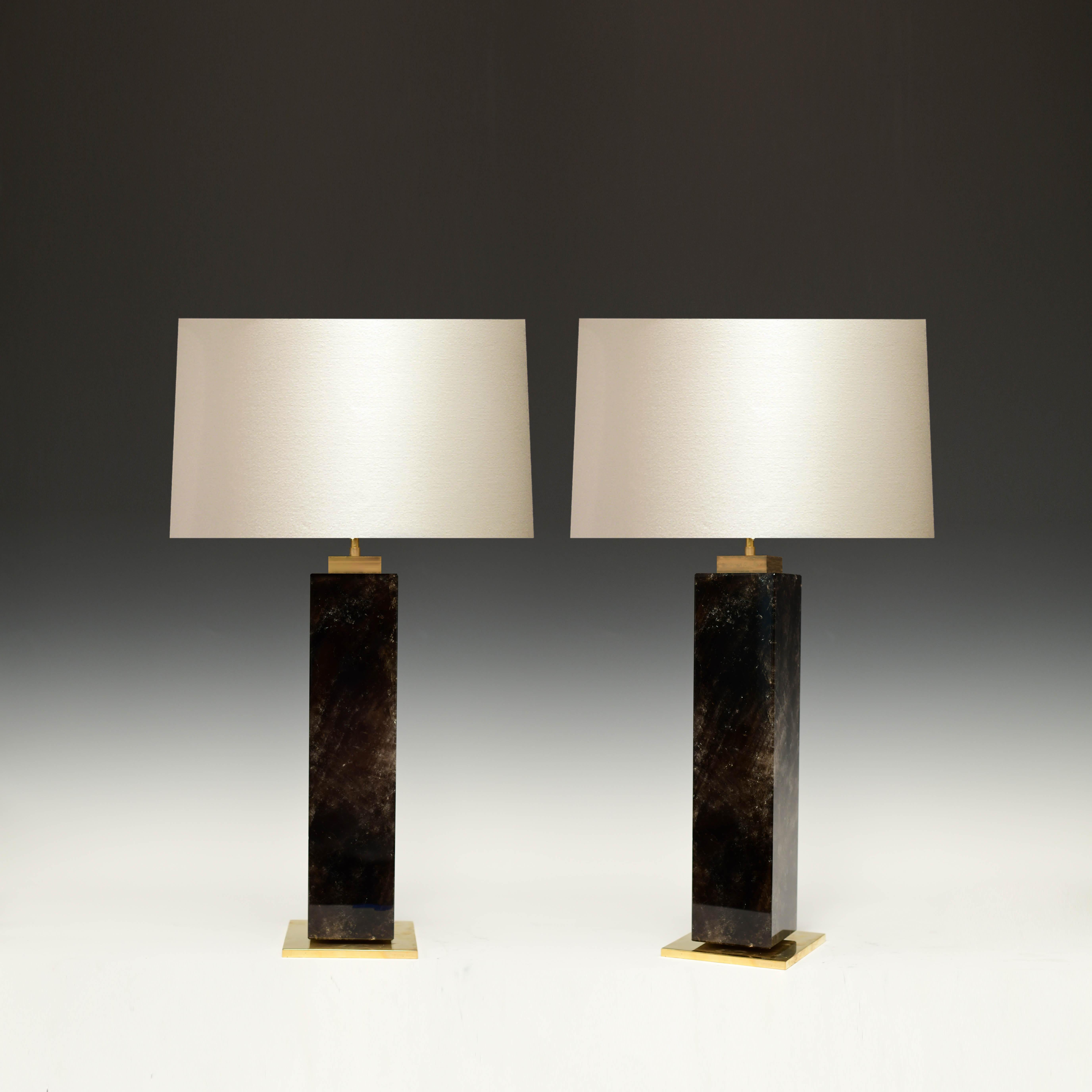 Column form dark rock crystal lamps with the polish brass base. Created by Phoenix, NYC. 
To the top of the rock crystal: 18