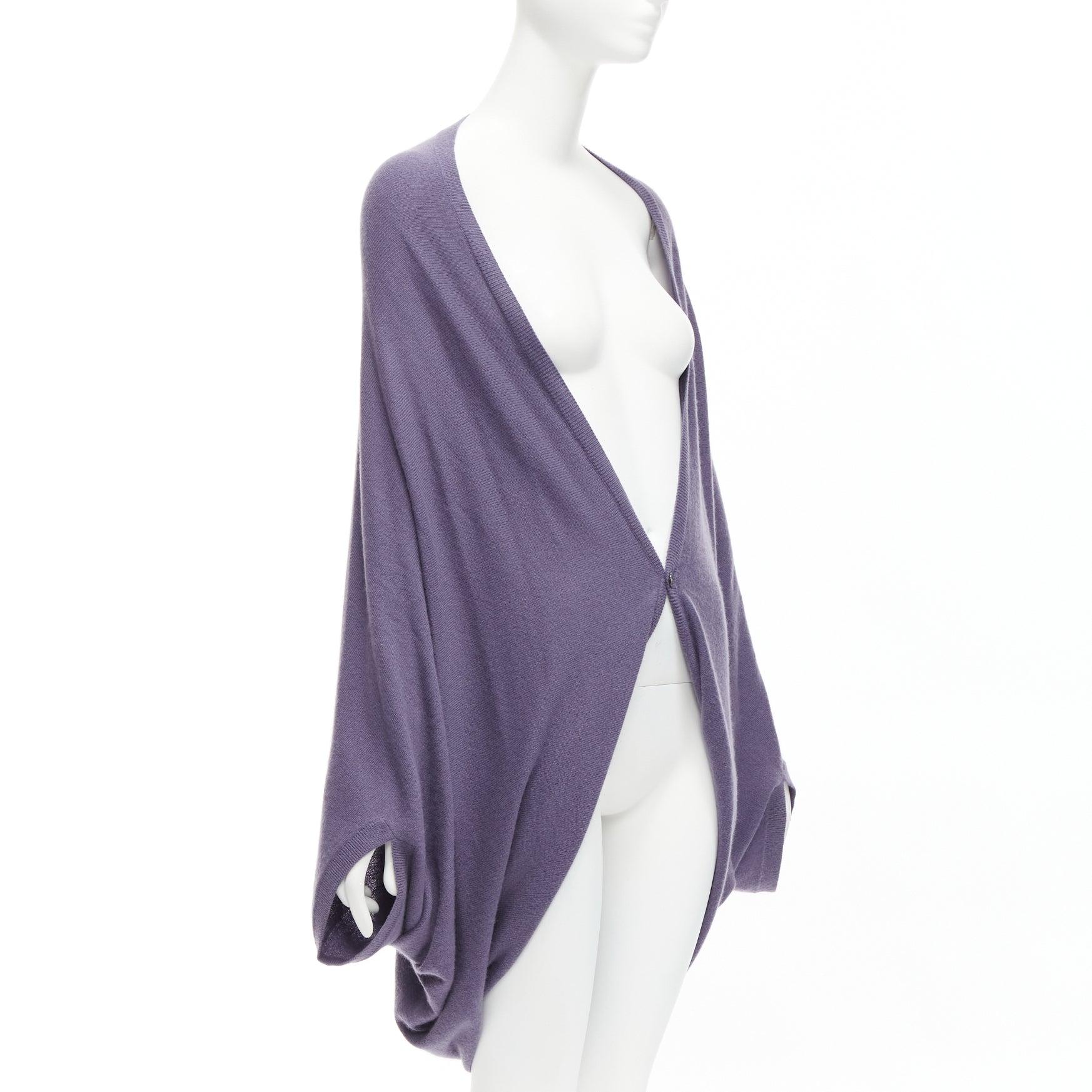 TSE 100% pure cashmere purple low cut batwing shawl cardigan
Reference: DYTG/A00057
Brand: Tse
Material: Cashmere
Color: Purple
Pattern: Solid
Closure: Button

CONDITION:
Condition: Excellent, this item was pre-owned and is in excellent condition.