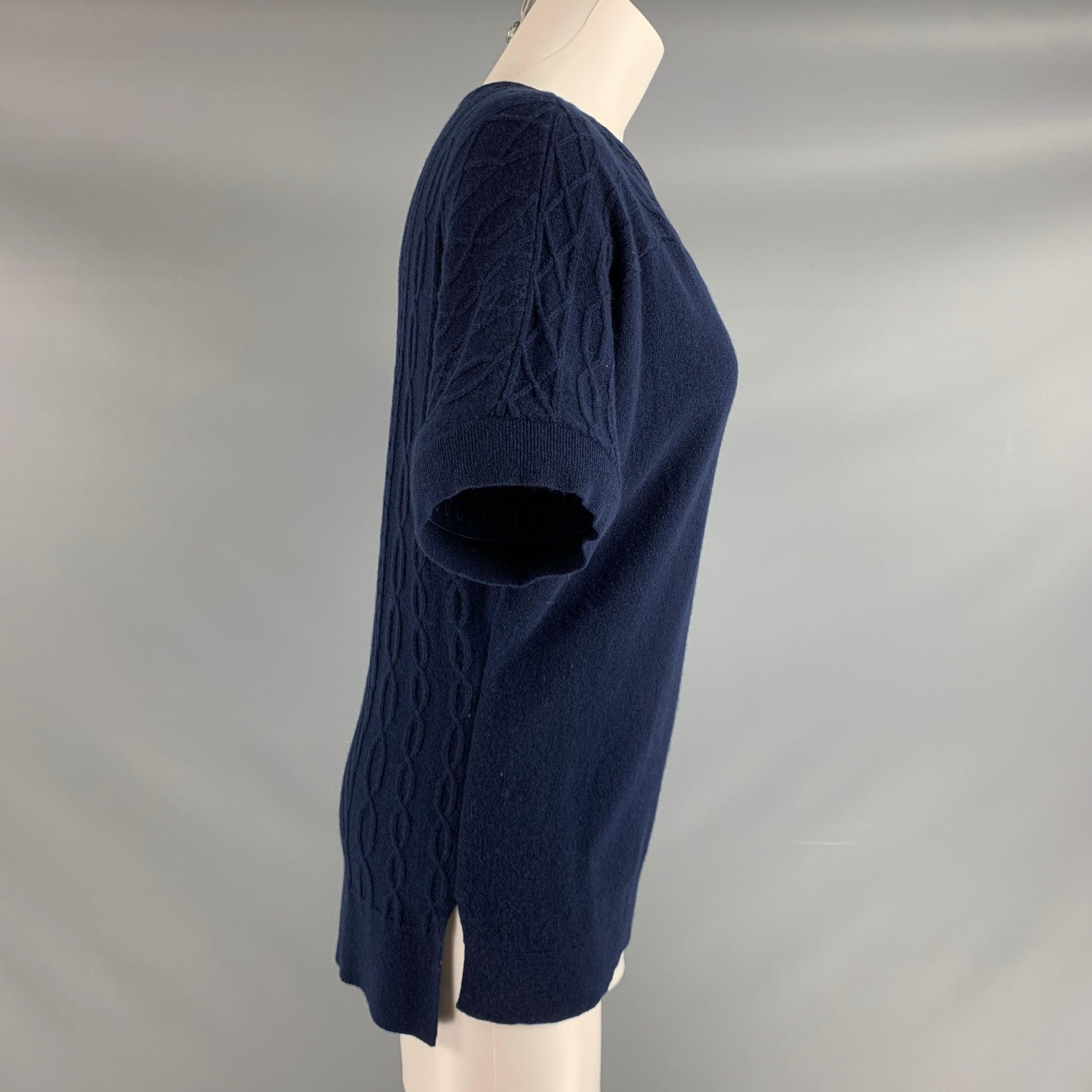 TSE casual top comes in navy cashmere knit material features a V-neck. Excellent Pre-Owned Condition.Marke: M 

Measurements: 
 
Shoulder: 15 inches Chest: 44 inches Sleeve: 7.5 inches Length: 27 inches  
 
  
  
 
Sui Generis Reference: