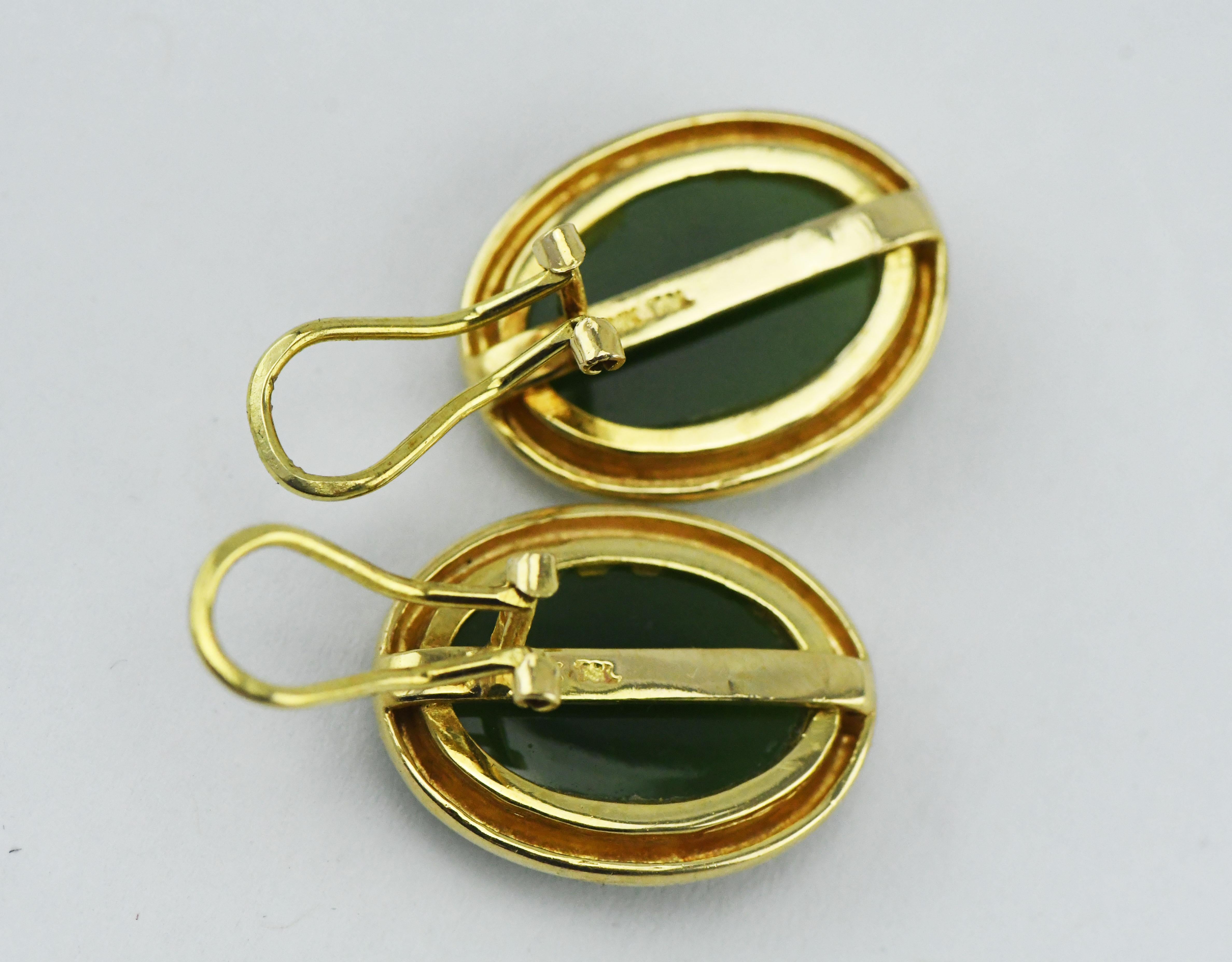 Contemporary Tse Sui Luen 14 Karat Gold Earrings with Cabochon Carved Jade with Omega Backs For Sale