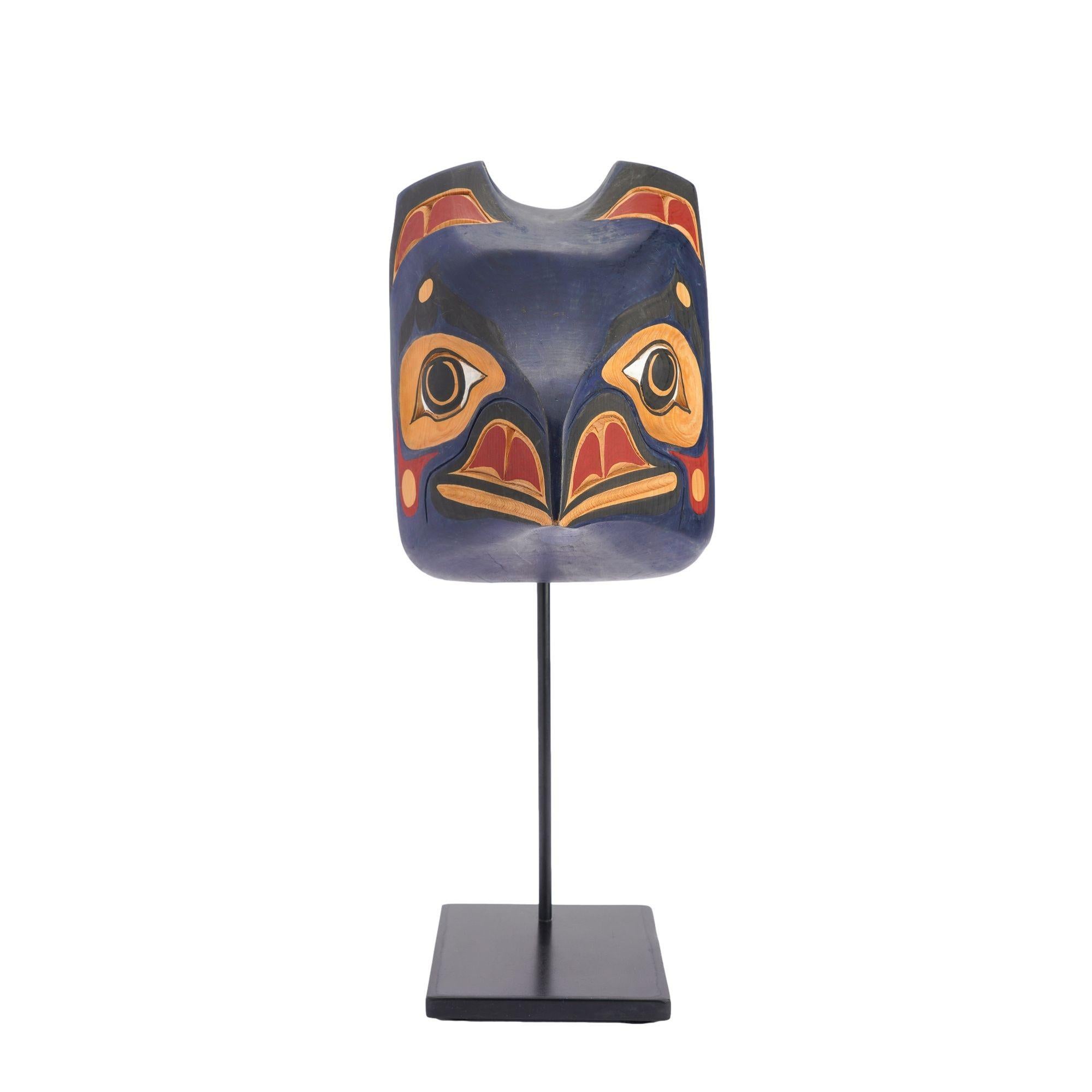 Pacific Northwest Native American carved and painted raven mask. The Raven mask is worn by the performers of the Git-Hoan to enhance their identification with their clan talisman.

Initialed 