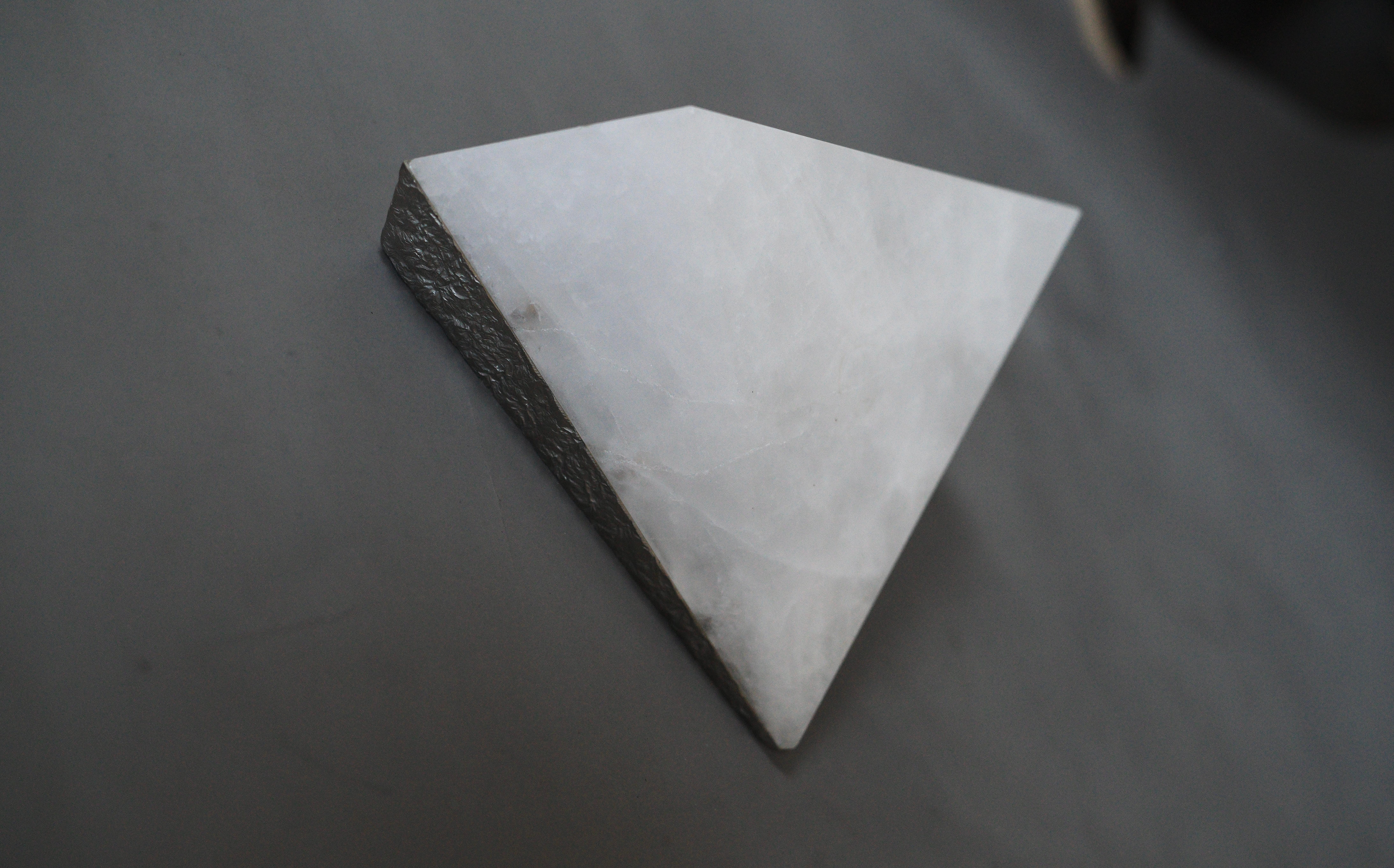 Finely carved rock crystal prism. 
One E12 socket installed,80w total 
Created by Phoenix 
2 inch by 4 inch jbox 
Custom sizes upon request 