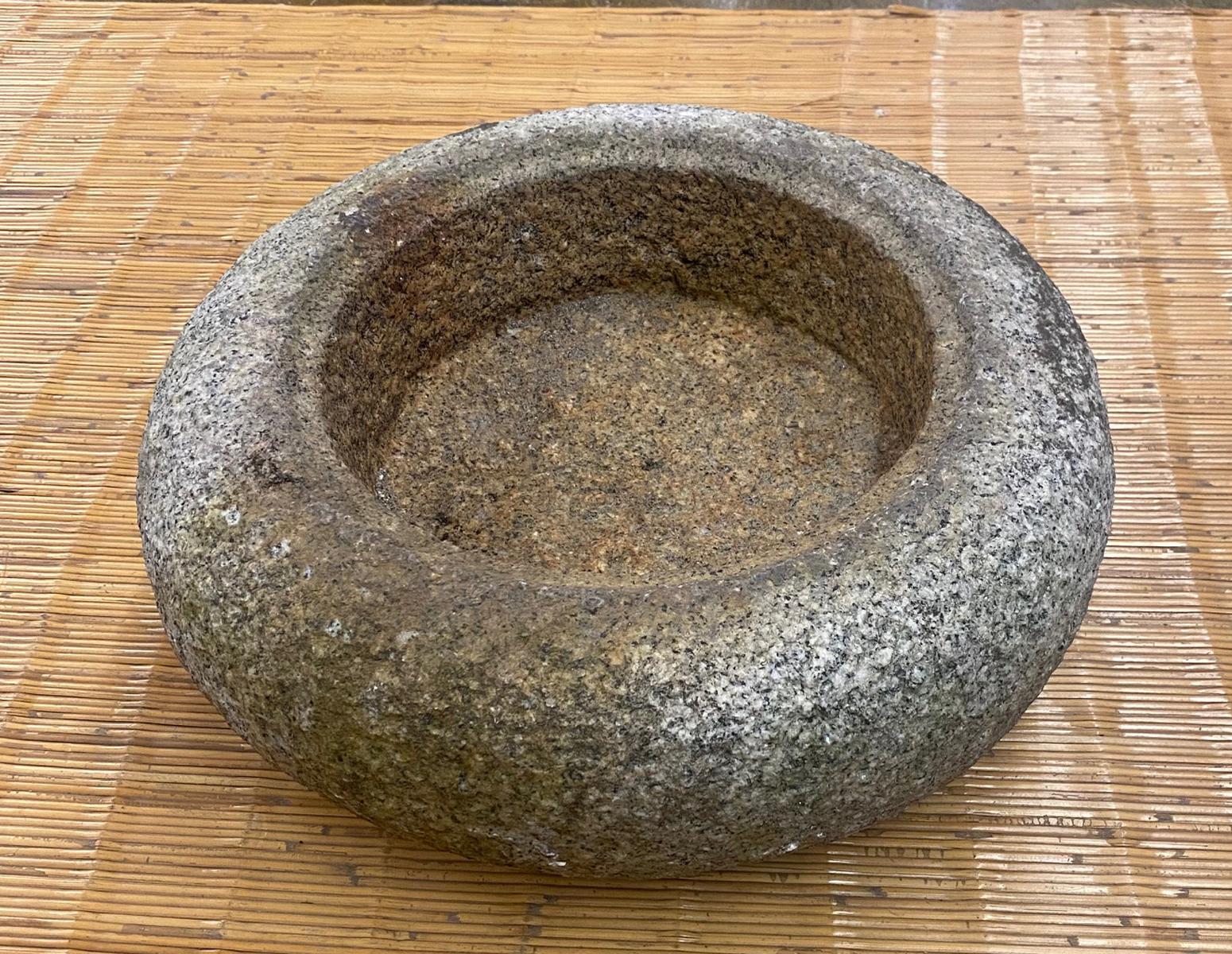 A small scale water trough is often a feature in a Japanese Garden, with dripping water. This granite Tsukubai is perfectly shaped with out chips or cracks. Old and beautiful.