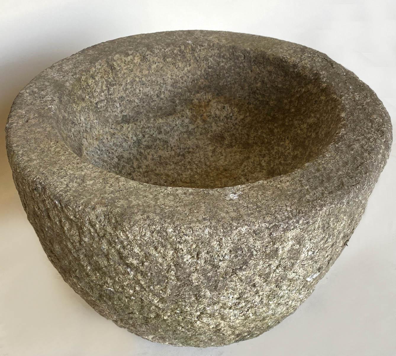 Vintage Japanese Tsukubai, stone basin. In the cleansing and purifying Japanese tea ceremony stone basins are included in tea gardens so that guests can symbolically dip their hands before entering the tea house. The stone basin is usually
