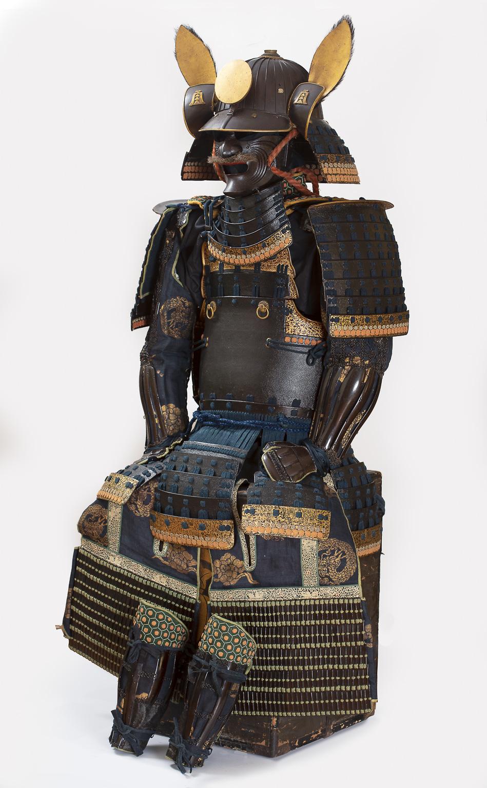 Tsutsumi-do tosei gusoku
Samurai armor with leather-covered cuirass

Kaga school

Mid Edo period, 18th-19th century

 

The armor features two characteristics that can be often found on suits made in the region of Kaga: the leather surface