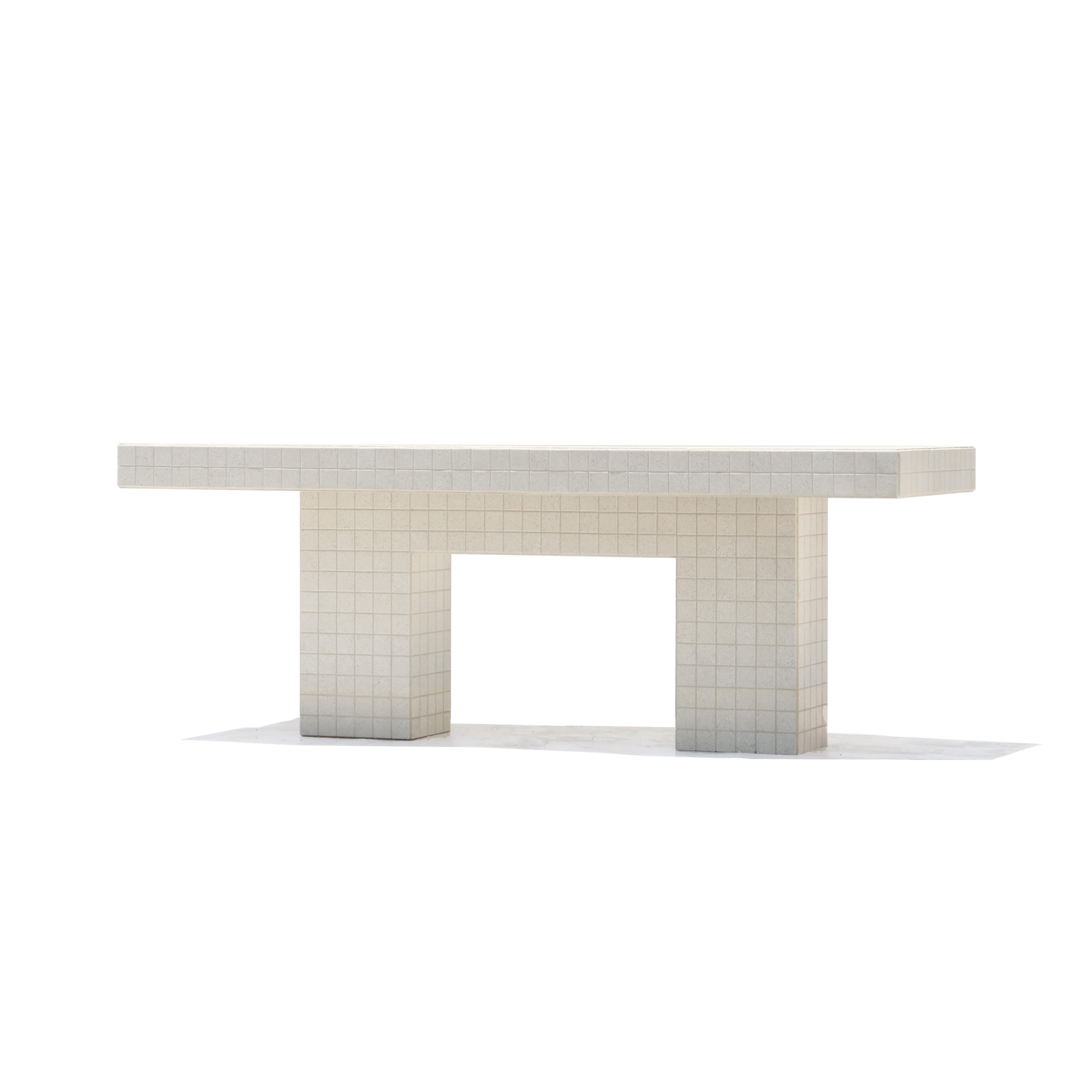 Designed and made by Nima Abili in Los Angeles this handcrafted table is cladded with speckled beige matte porcelain tiles and sanded beige grout. Inspired by Brutalist style of architecture this collection offers a variety of pieces designed based