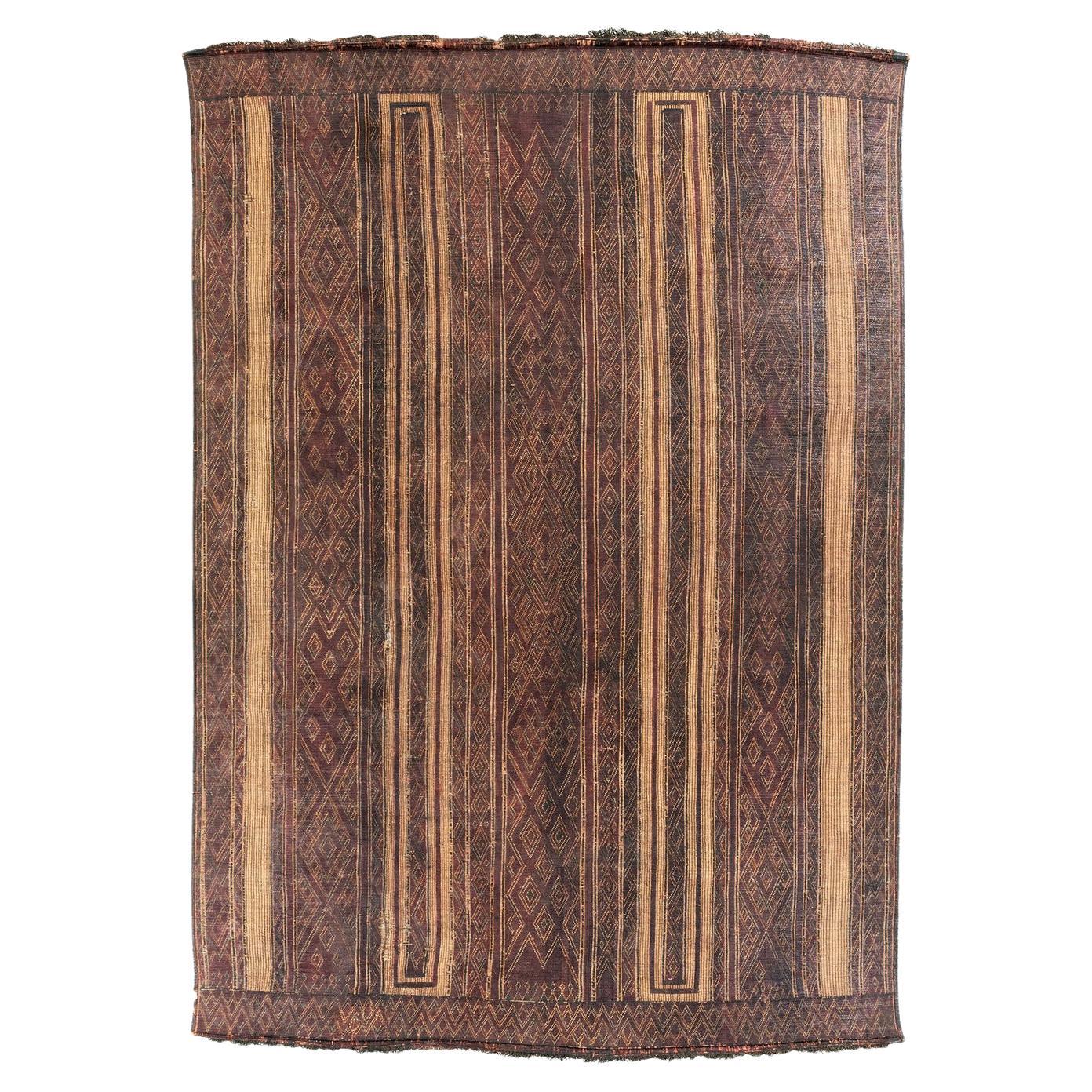 Tapis Touareg en cuir et roseau tressé