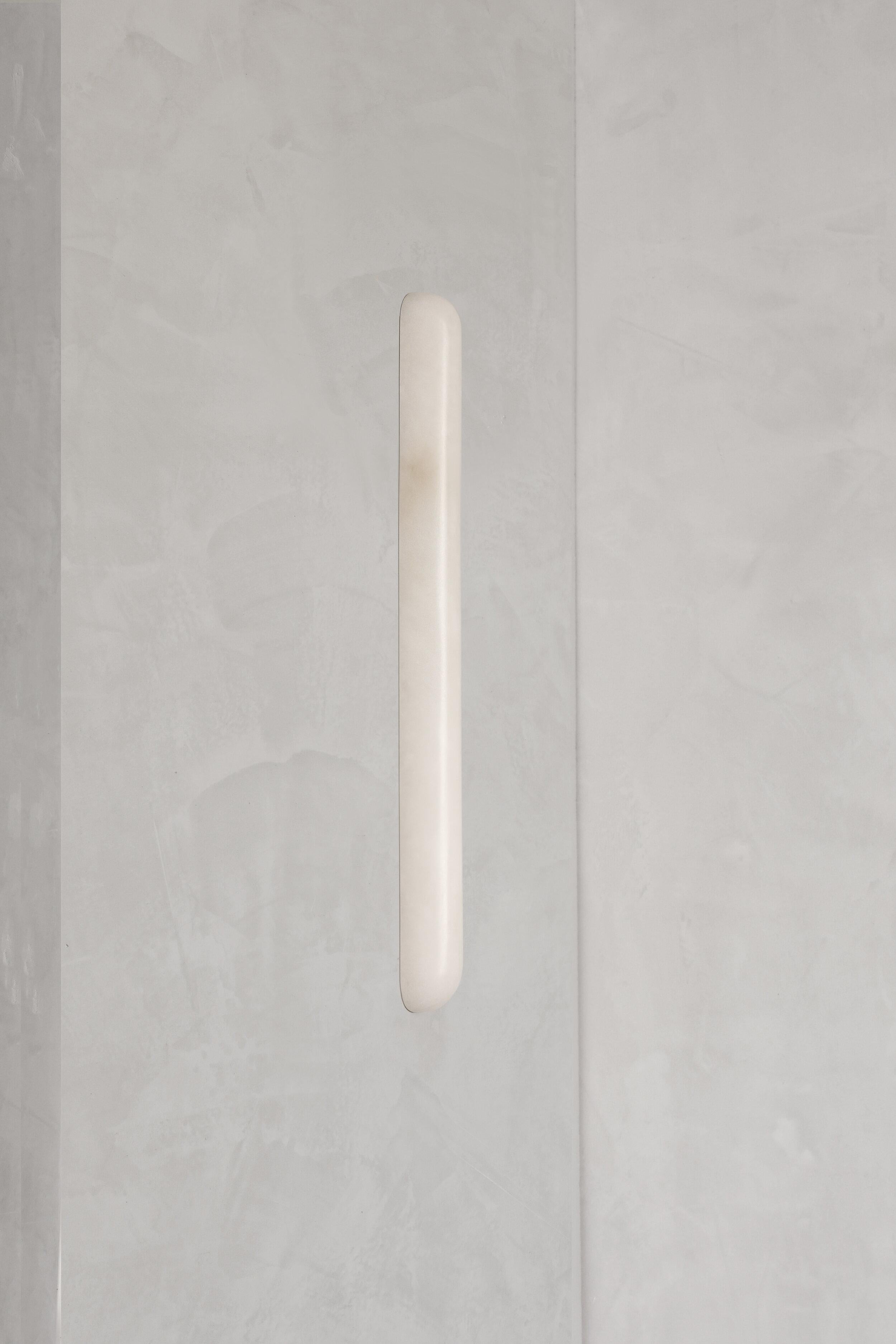 Tub 45 Alabaster wall light by Contain
Dimensions: D 4 x W4 x H45 cm
Materials: Alabaster
Also available in different dimensions.

All our lamps can be wired according to each country. If sold to the USA it will be wired for the USA for