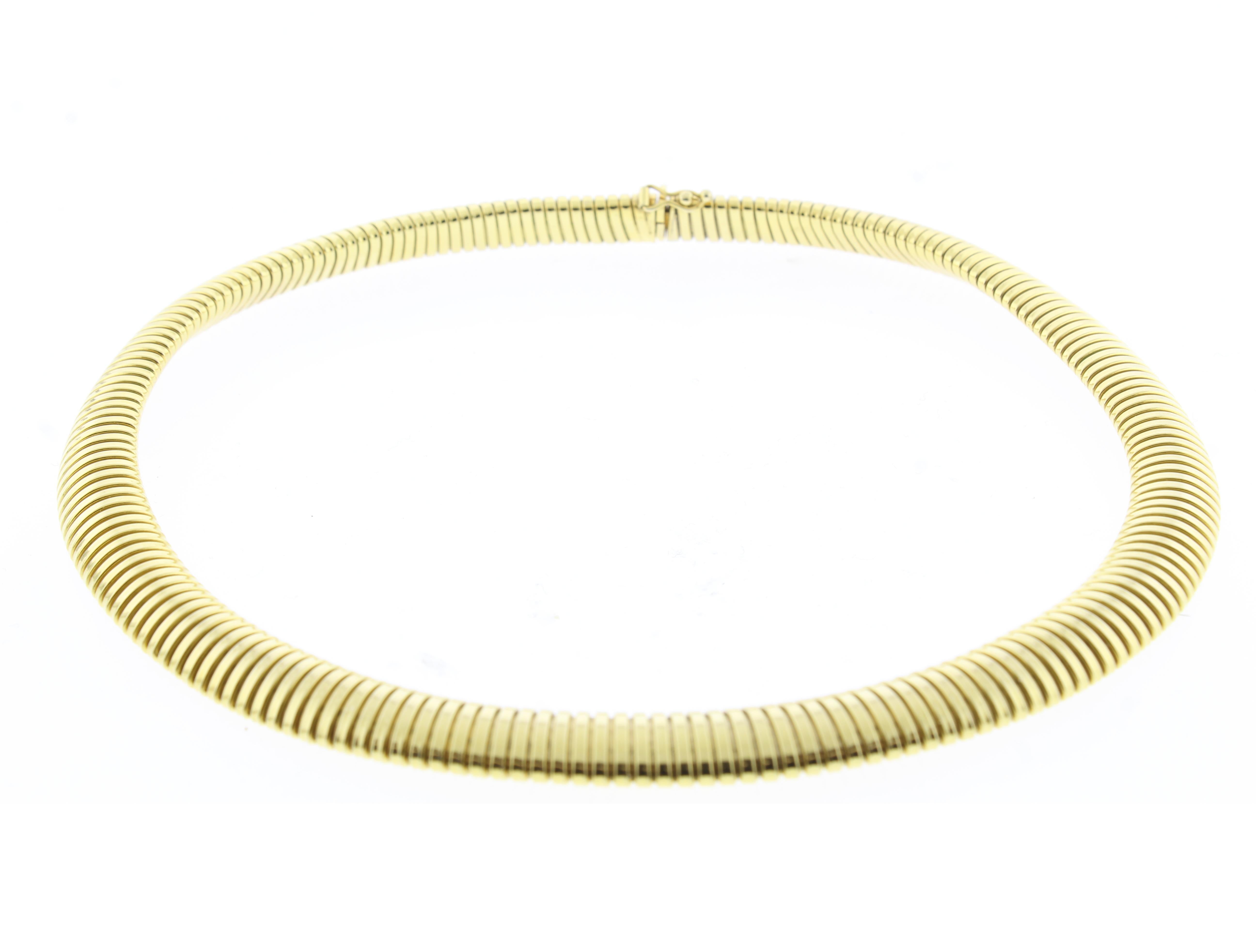 A Classic Italian tubogas necklace. Tubogas translates literally to “gas pipe” and is the descriptive name given to a type of chain formed from a pair of interlocking gold strips wrapped tightly together. This forms a flexible and hollow tubular