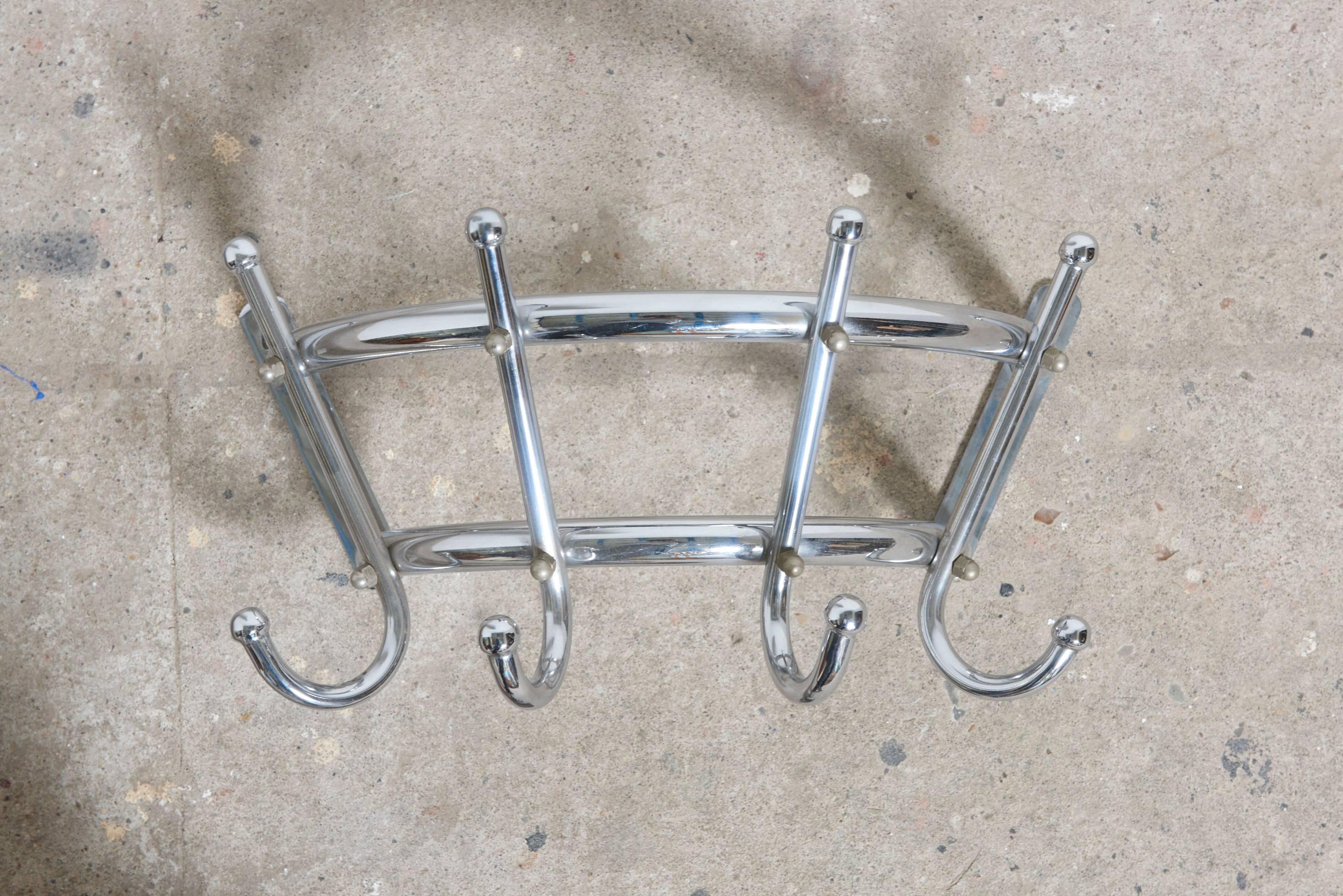 Vintage chrome half round wall hanging coat rack with four chrome hooks.
Perfect for small homes when everything’s in harmony and organized, even the tiniest space can feel expansive and refreshingly Minimalist.