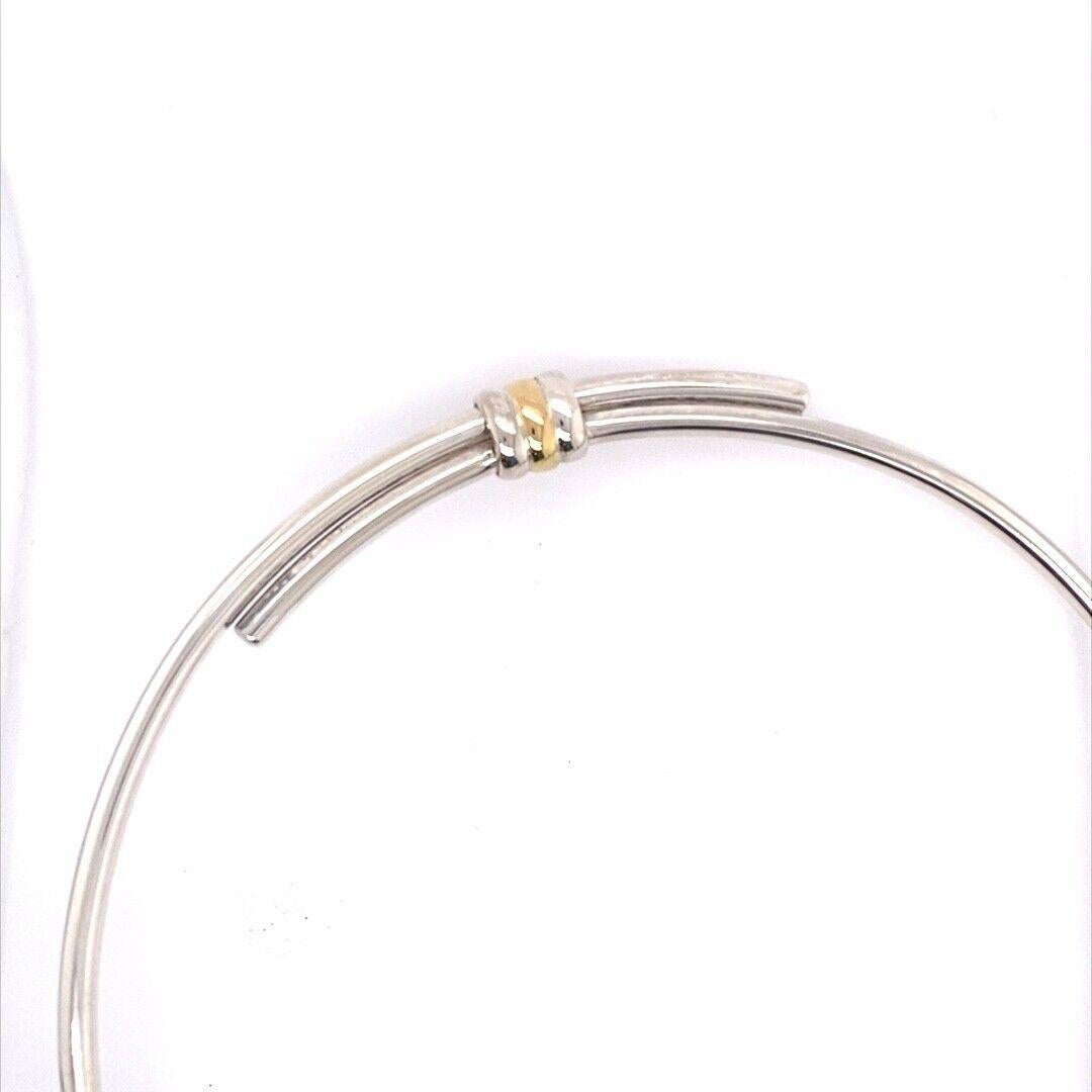 800 Silver and 18ct Yellow Gold Tube Necklace in Very Good Condition, 82.9g

Silver and 18ct Yellow Gold Tube Necklace. In very good condition. The necklace has a trigger catch clasp.

Additional Information: 
Silver Weight: 82.9g
Silver Purity: