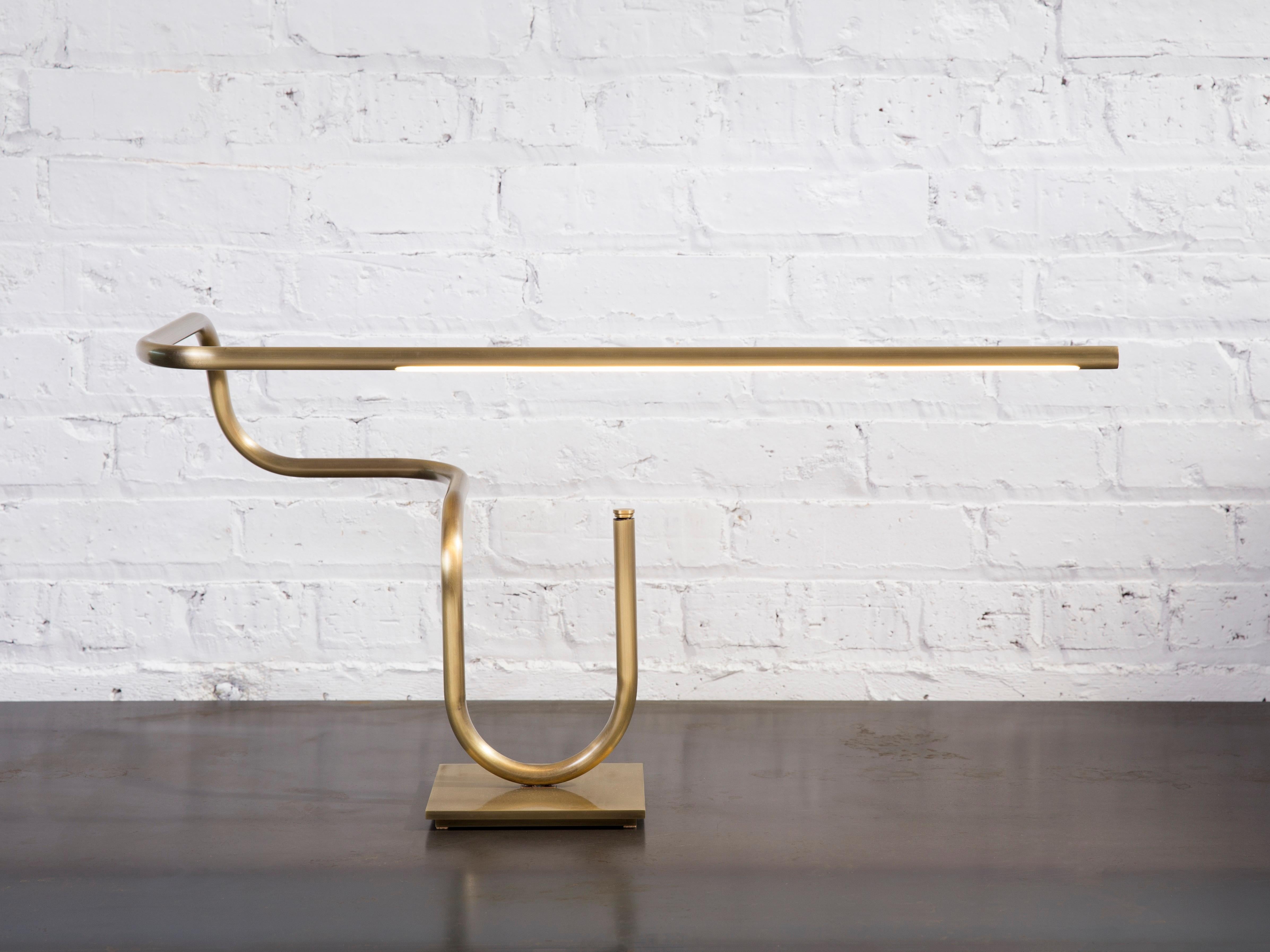 Tube table lamp by Gentner Design
Dimensions: D 60 x W 35.5 x H 35.5 cm
Materials: tarnished brass
Available in darkened brass and tarnished brass.

All our lamps can be wired according to each country. If sold to the USA it will be wired for