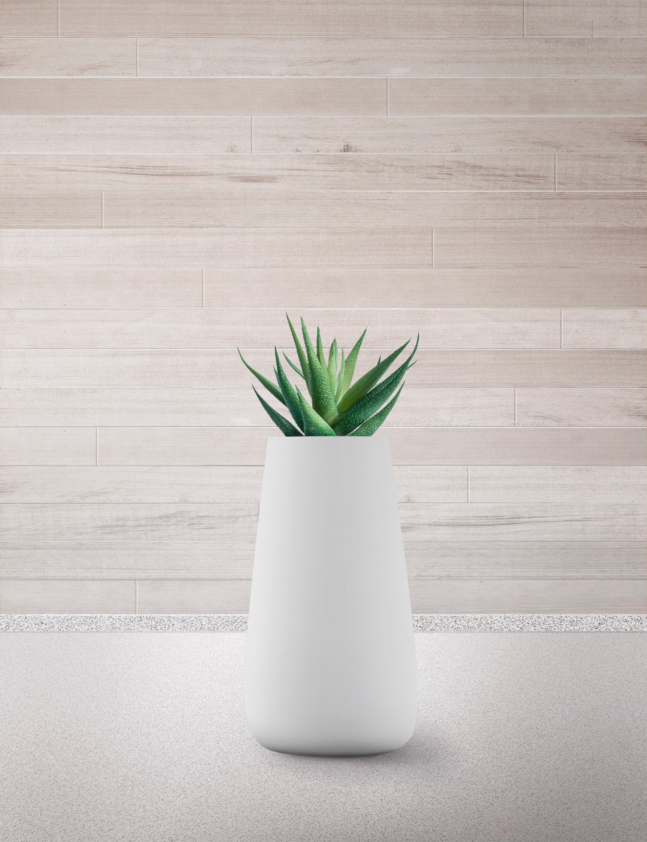 Tuber Tall Brown Planter by Indigenus
Designed by Haldane Martin
Dimensions: Ø 48 x H 109 cm.
Materials: Stone.
Weight: 58 kg.

Different colors and sizes are available. Please contact us.

Haldane Martin’s Tuber, as the name suggests, is inspired