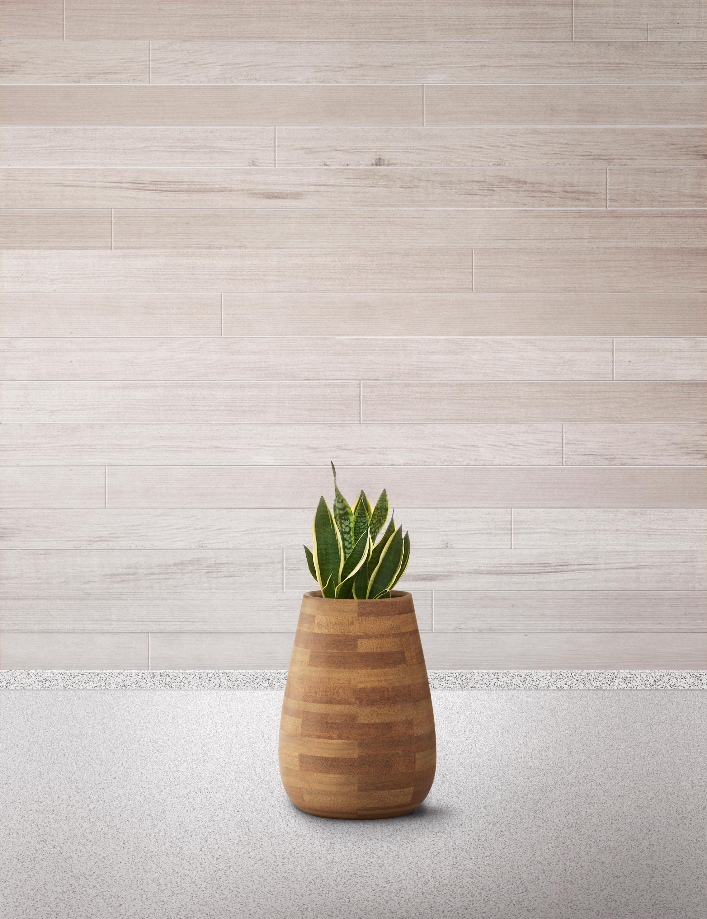 Tuber XS Oiled Wood Planter by Indigenus
Designed by Haldane Martin
Dimensions: Ø 29,7 x H 56,3 cm.
Materials: Wood.
Weight: 15 kg.

Available in natural/oiled wood or stone. Different colors and sizes are available. Please contact us.

Haldane