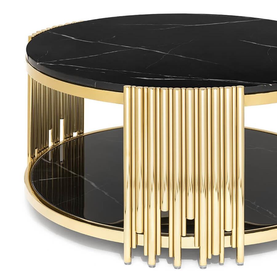 Coffee table tubes II with structure in 
steel in gold finish and with black resin marble top.