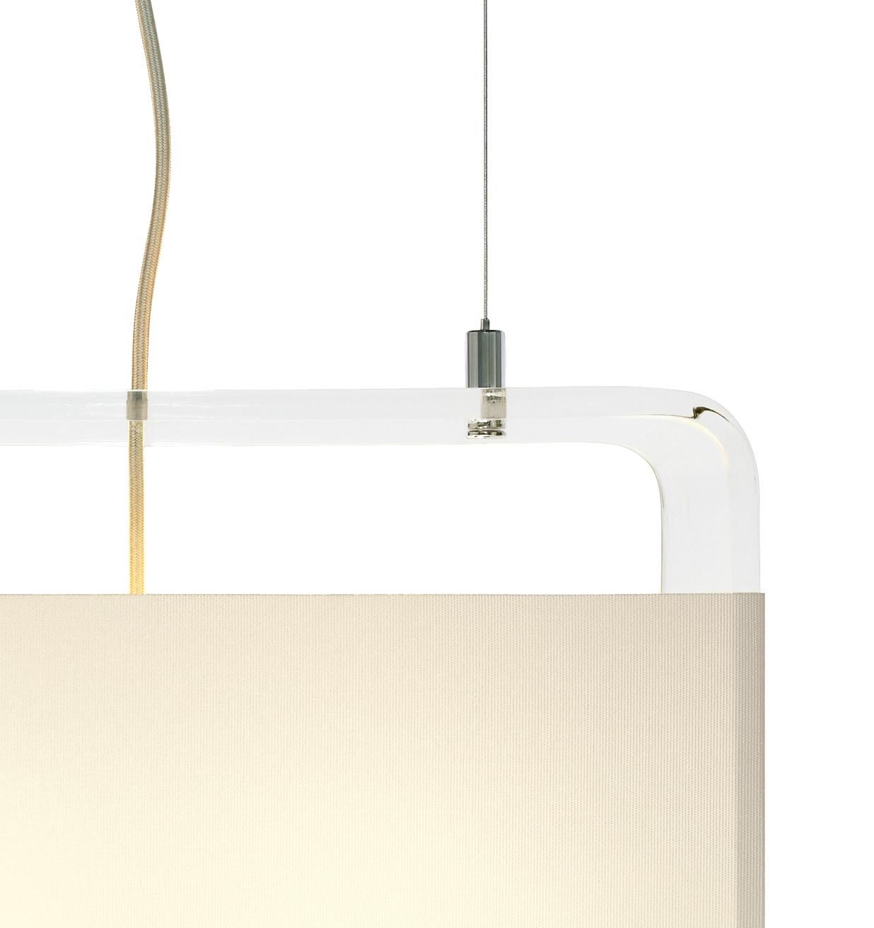 Tube Top is newly reborn as a suspension lamp, fusing its brilliant transparent acrylic surfaces with a soft and diffused fabric shade held in tension. Tube Top pendant is a minimalist statement in form and proportion providing remarkable and fully