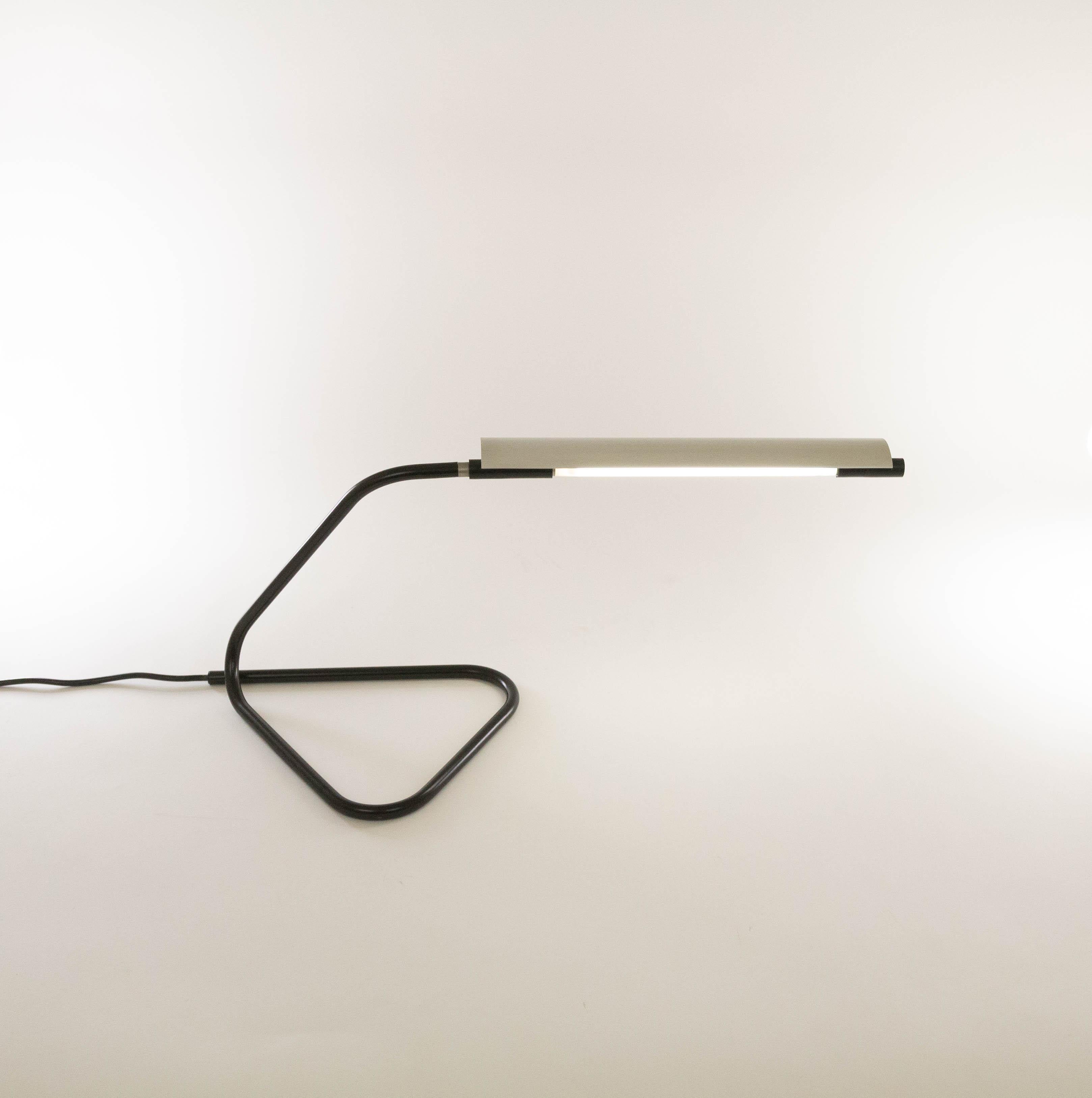 This table lamp, named Tubino, was designed by Achille and Pier Giacomo Castiglioni already in 1949 (!). Initially, the lamp was produced by Arredoluce, from the 1970s it was taken into production by Flos.

The lamp is specifically designed for a