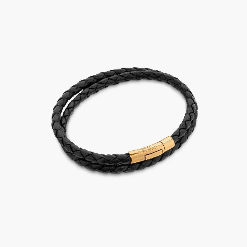 Tubo Scoubidou Double Wrap Bracelet in Black Leather and 18K Yellow Gold, Size M

Genuine black-coloured Italian leather is tightly woven into our classic double-wrap braid, designed to work as the base of your stack. Finished with an 18k yellow
