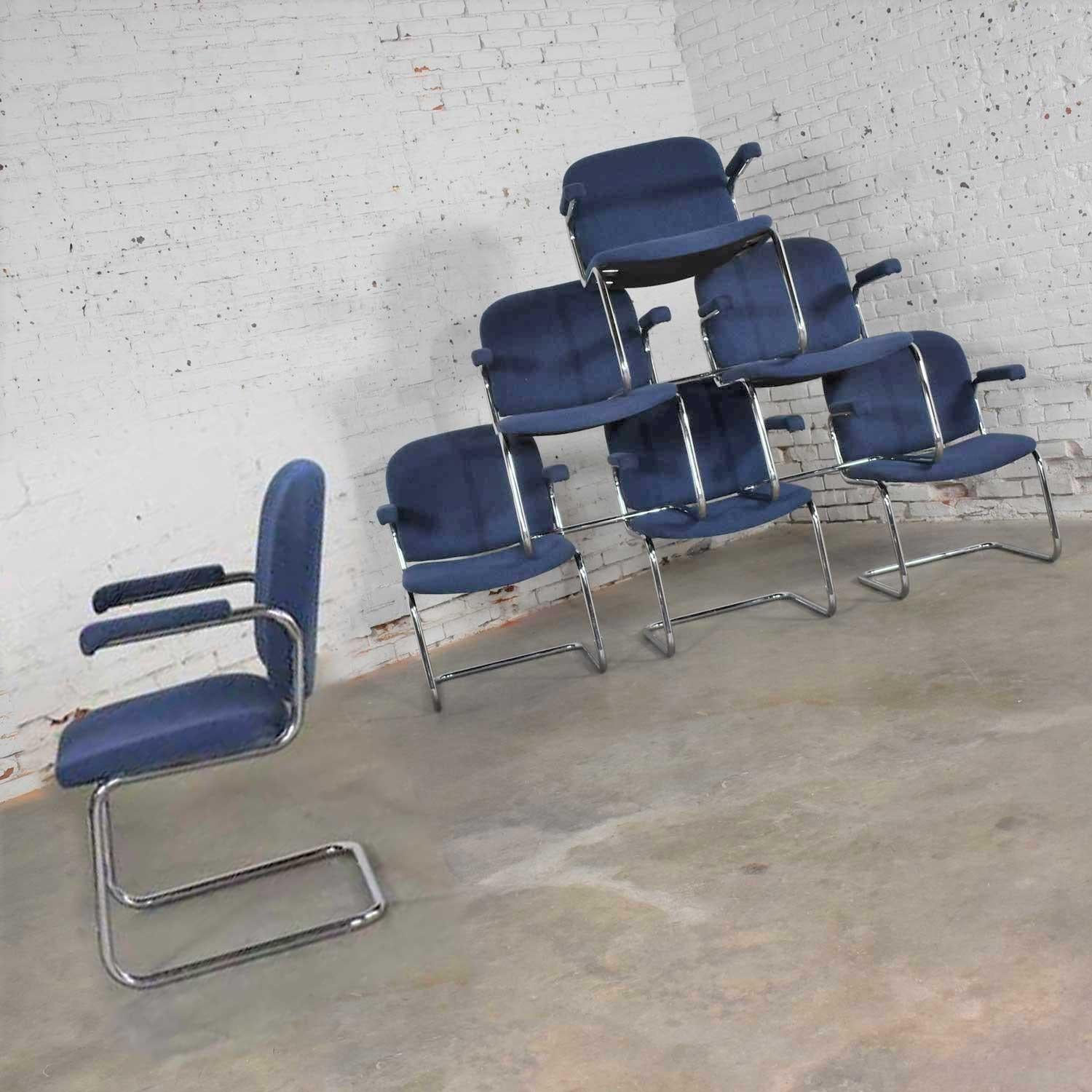 American Tubular Chrome and Blue Fabric Cantilever Lounge Chair with Arms Set of 7 For Sale