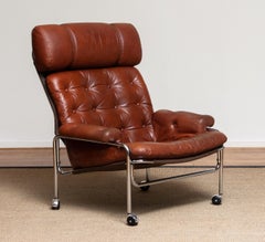 Verchromter Sessel mit braunem Cognacleder von Lindlöfs. Schweden 1960er Jahre