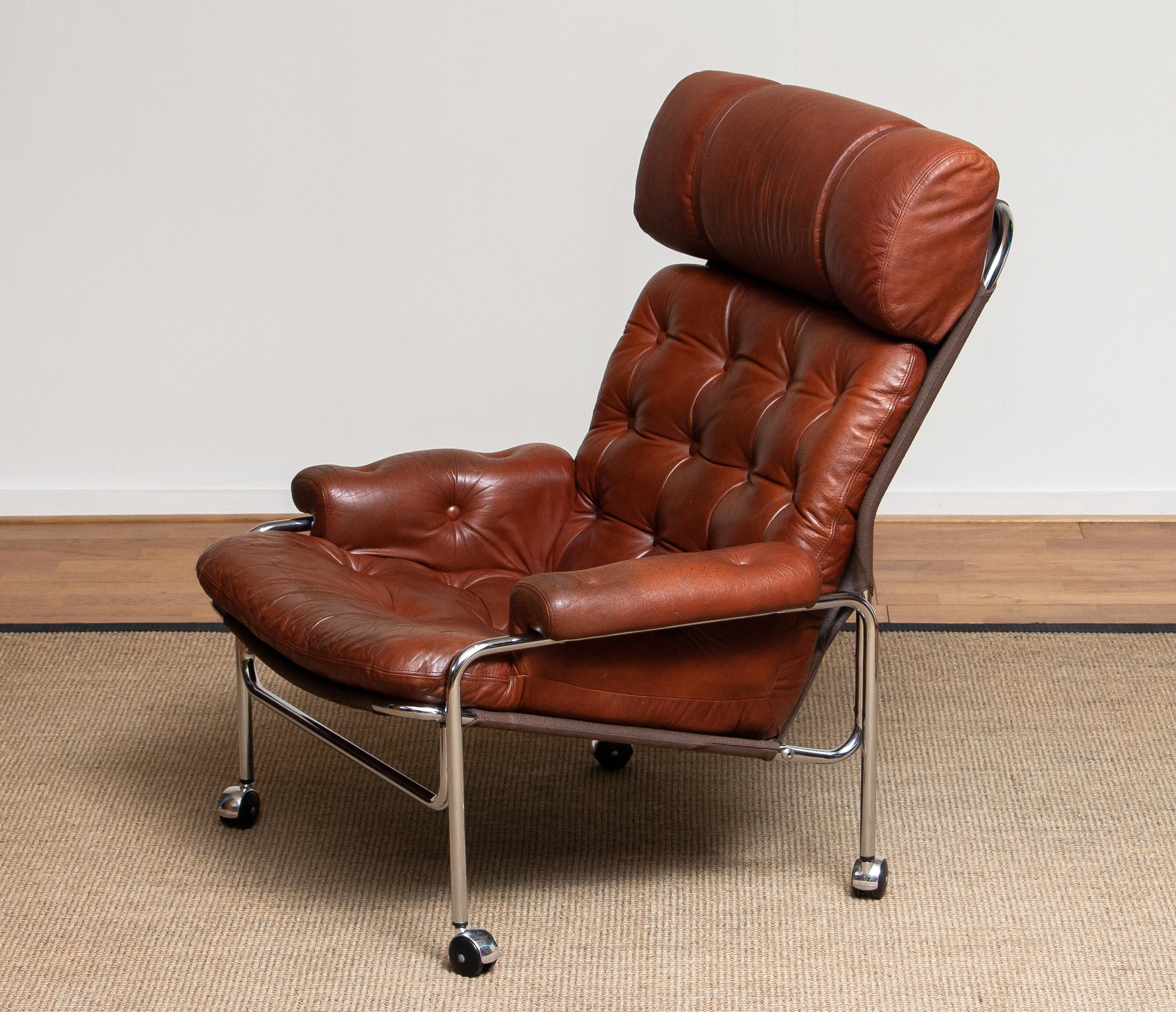 Swedish Tubular Chromed Lounge Chair With Brown Cognac Leather By Lindlöfs. Sweden 1960s