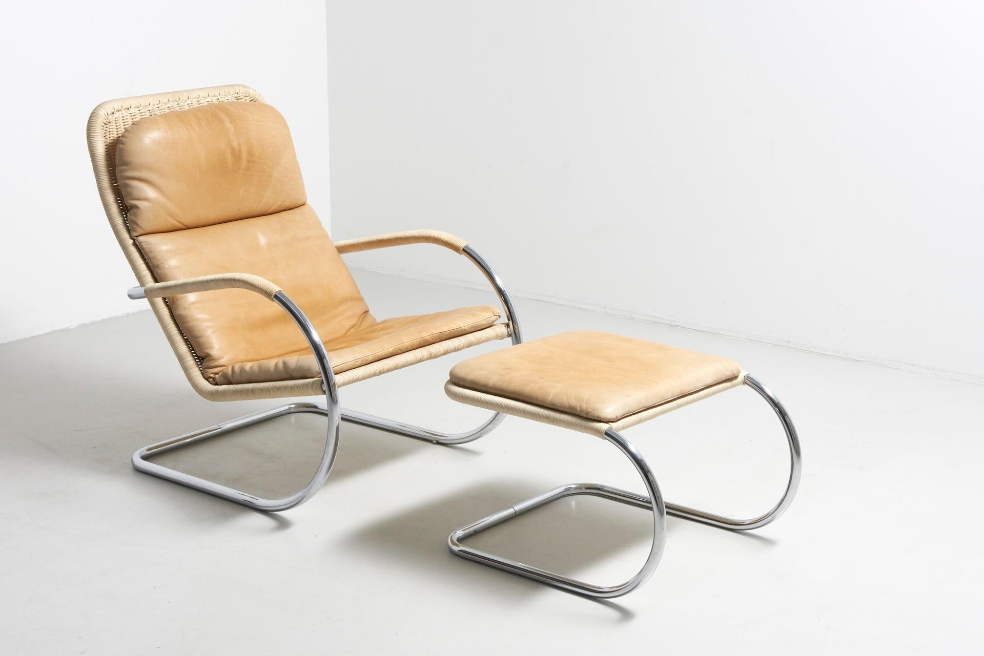 Tubular lounge chair with ottoman. This chair was originally designed in 1932 and reintroduced by Tecta in 1987. The chair´s backrest, seat and footstool base is made of woven cane on a chromed tubular steel frame. Armrest is wrapped in cane as