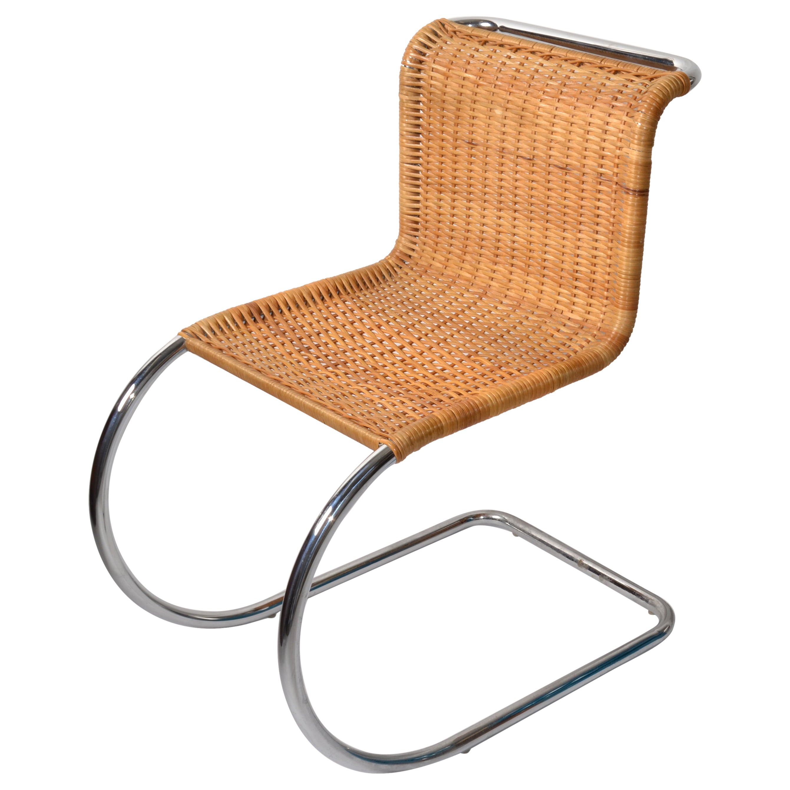 Sedia tubolare Ludwig Mies van der Rohe attribuita a Mr Chair senza braccioli con seduta in canna intrecciata anni '70