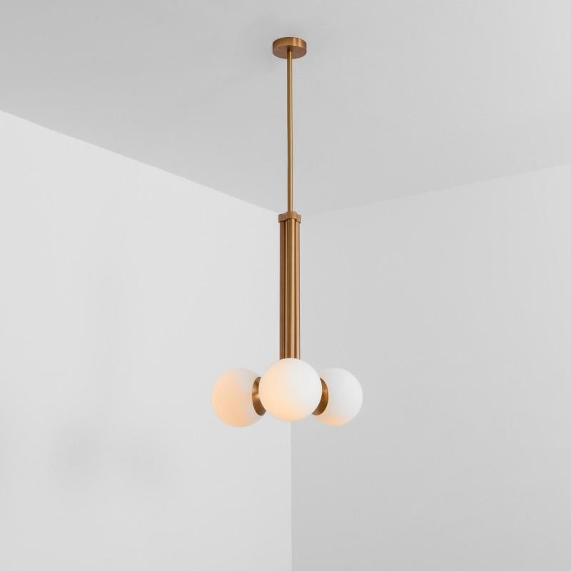 Tubular MD Brass Pendant Light by Schwung
Dimensions: W 49 x D 49 x H 88 cm
Materials: Brass, frosted glass

Finishes available: Black gunmetal, polished nickel, brass

 Schwung is a German word, and loosely defined, means energy or momentumm