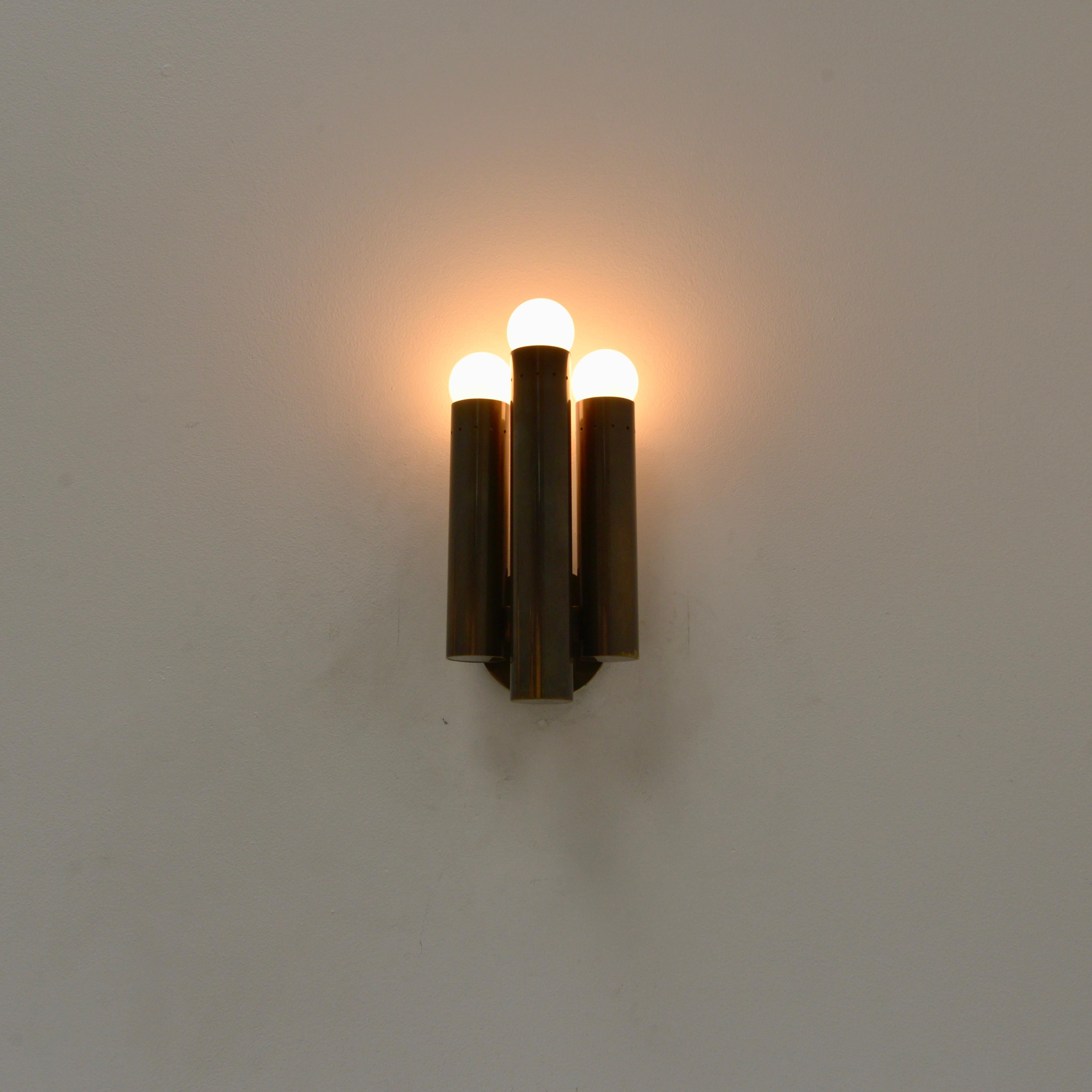 Patinated Tubular Sconce For Sale