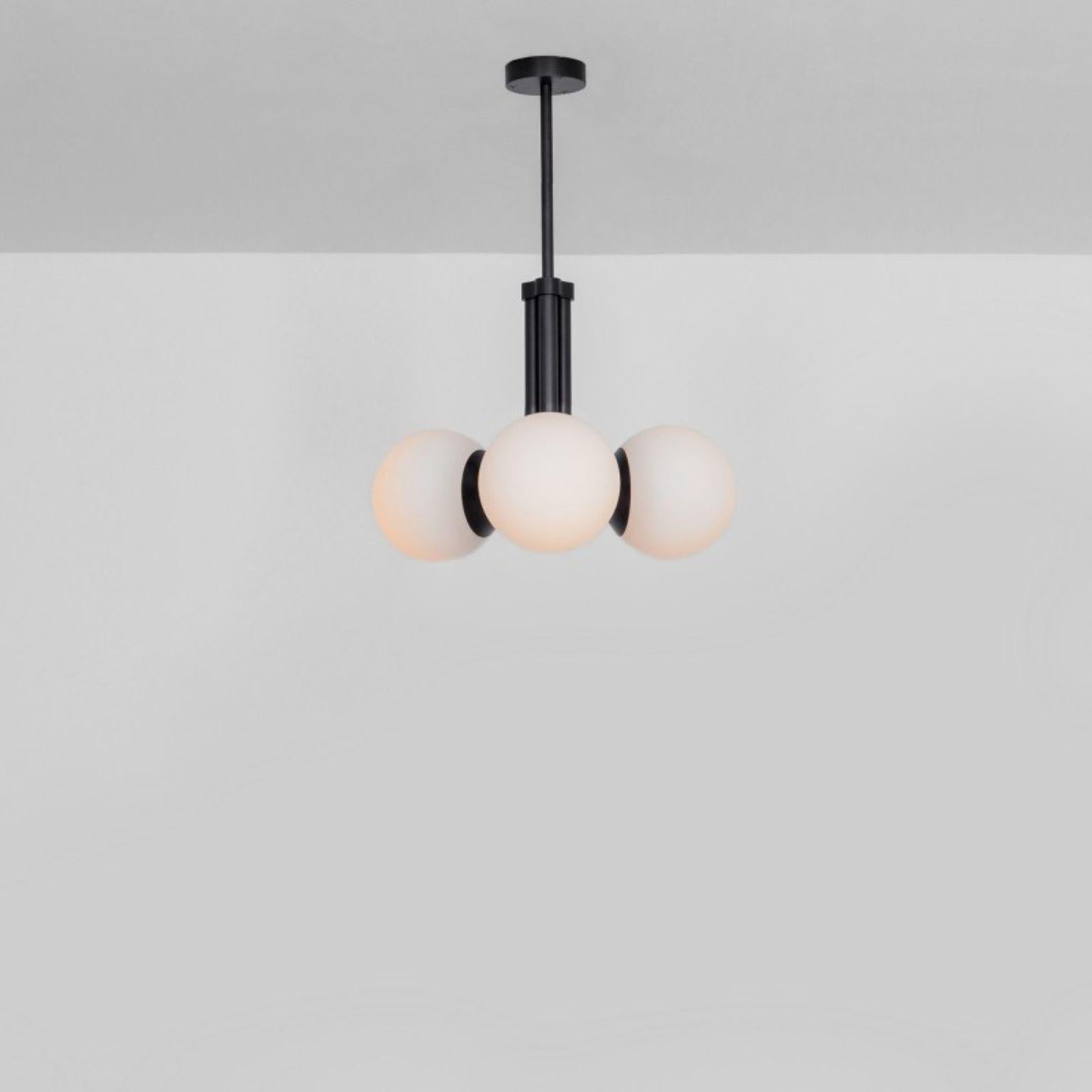 Tubular SM Black Pendant Light 3 by Schwung
Dimensions: W 48 x D 48 x H 58 cm
Materials: Black gunmetal, frosted glass

Finishes available: Black gunmetal, polished nickel, brass


Schwung is a German word, and loosely defined, means energy or
