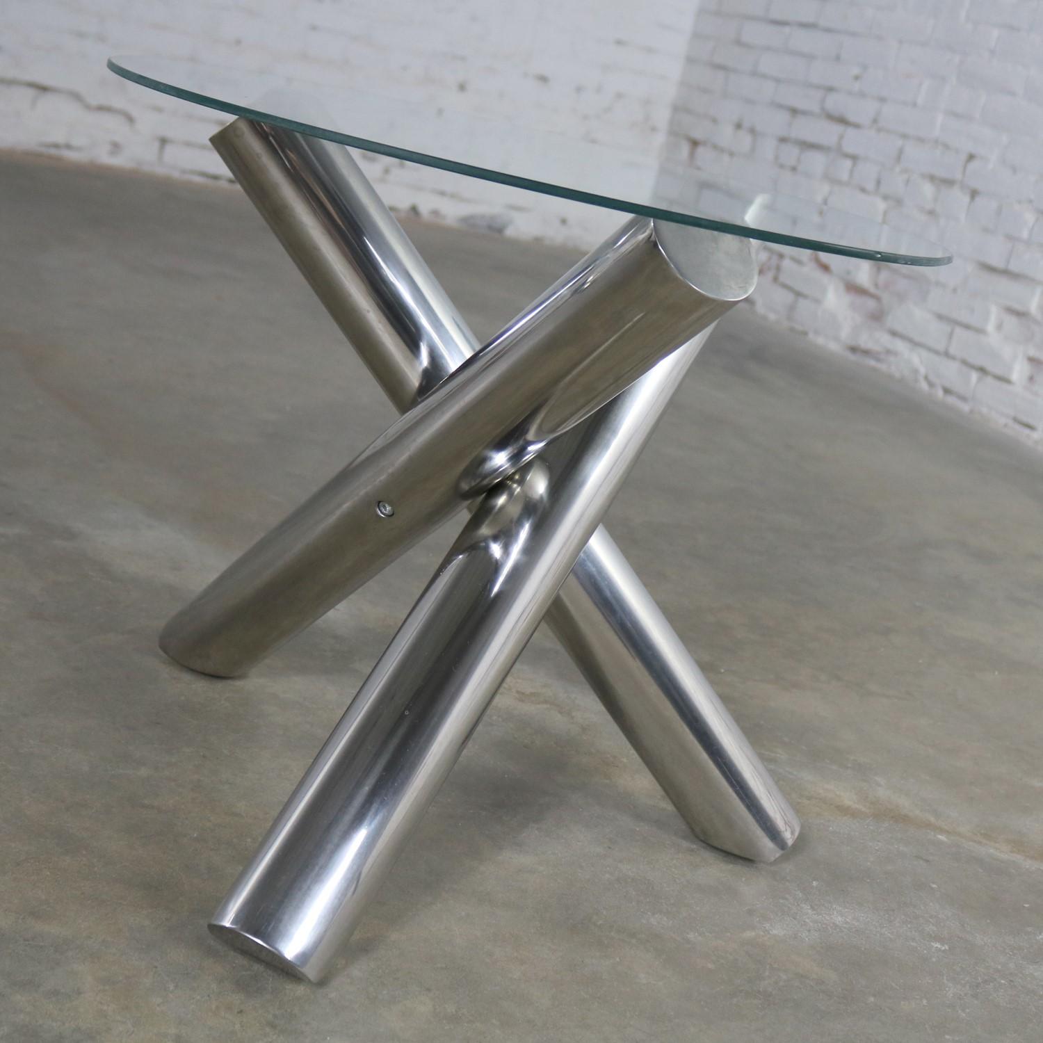 Incredible stainless-steel jacks shaped or tripod end table or side table with a round glass top. It is in wonderful vintage condition with no outstanding flaws we have detected. Please see photos. We will include glass top unless asked otherwise,